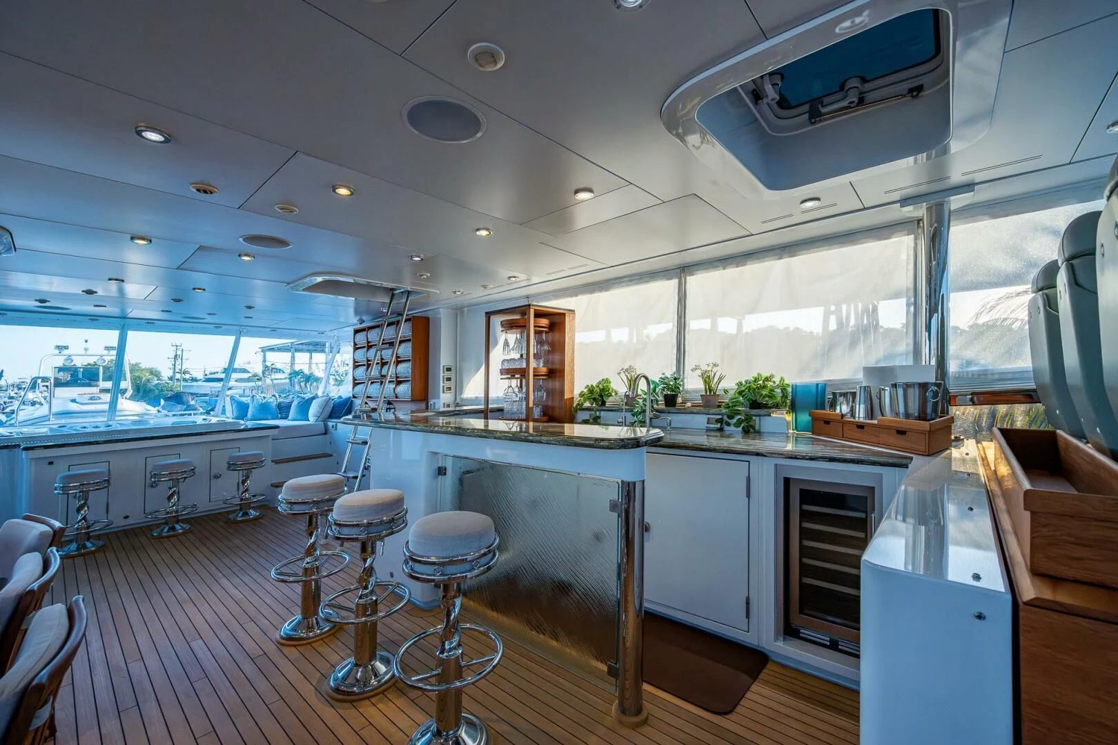a kitchen with stools and stools aboard KASHMIR Yacht for Charter