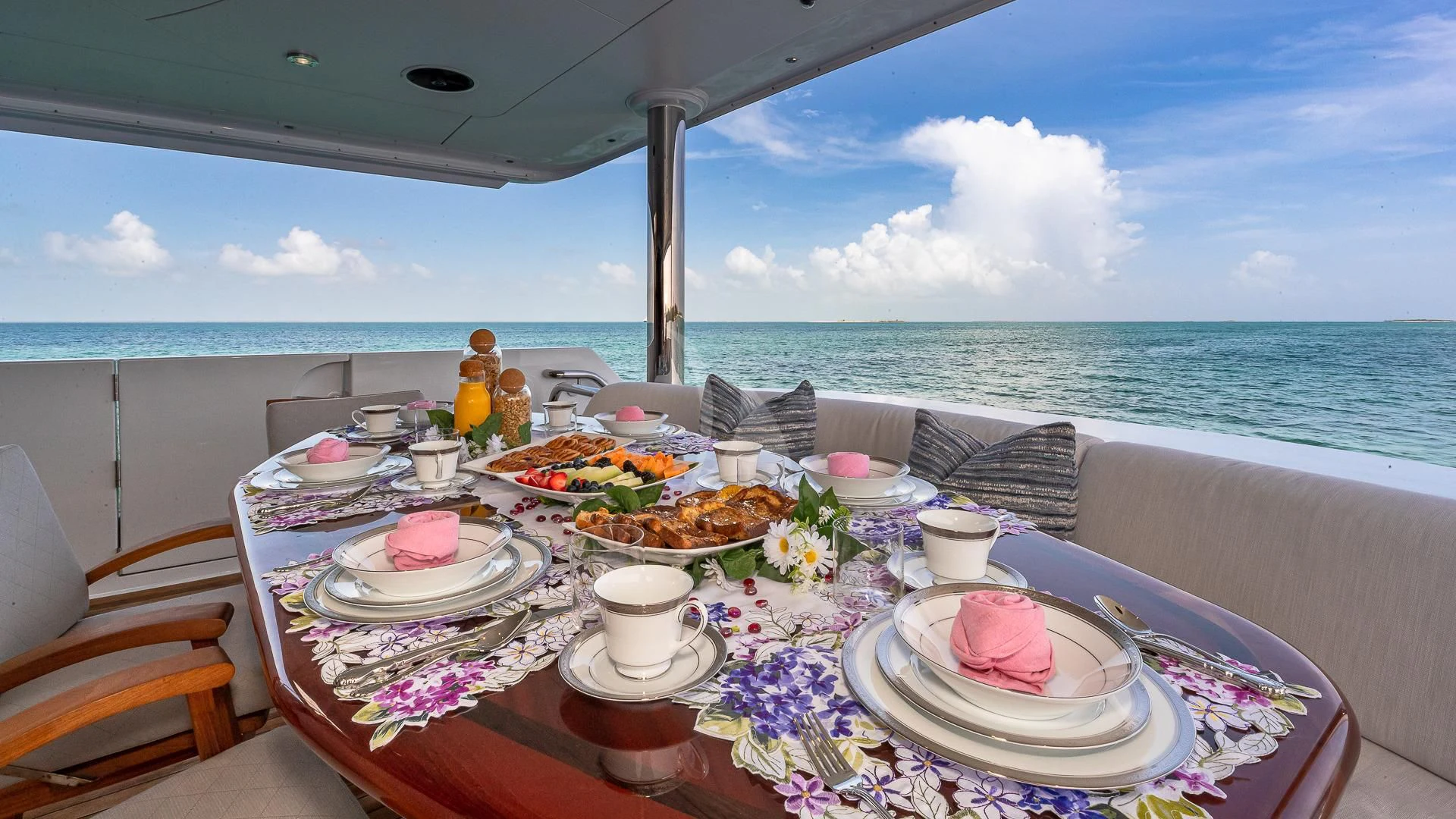 a table with food on it aboard KASHMIR Yacht for Charter