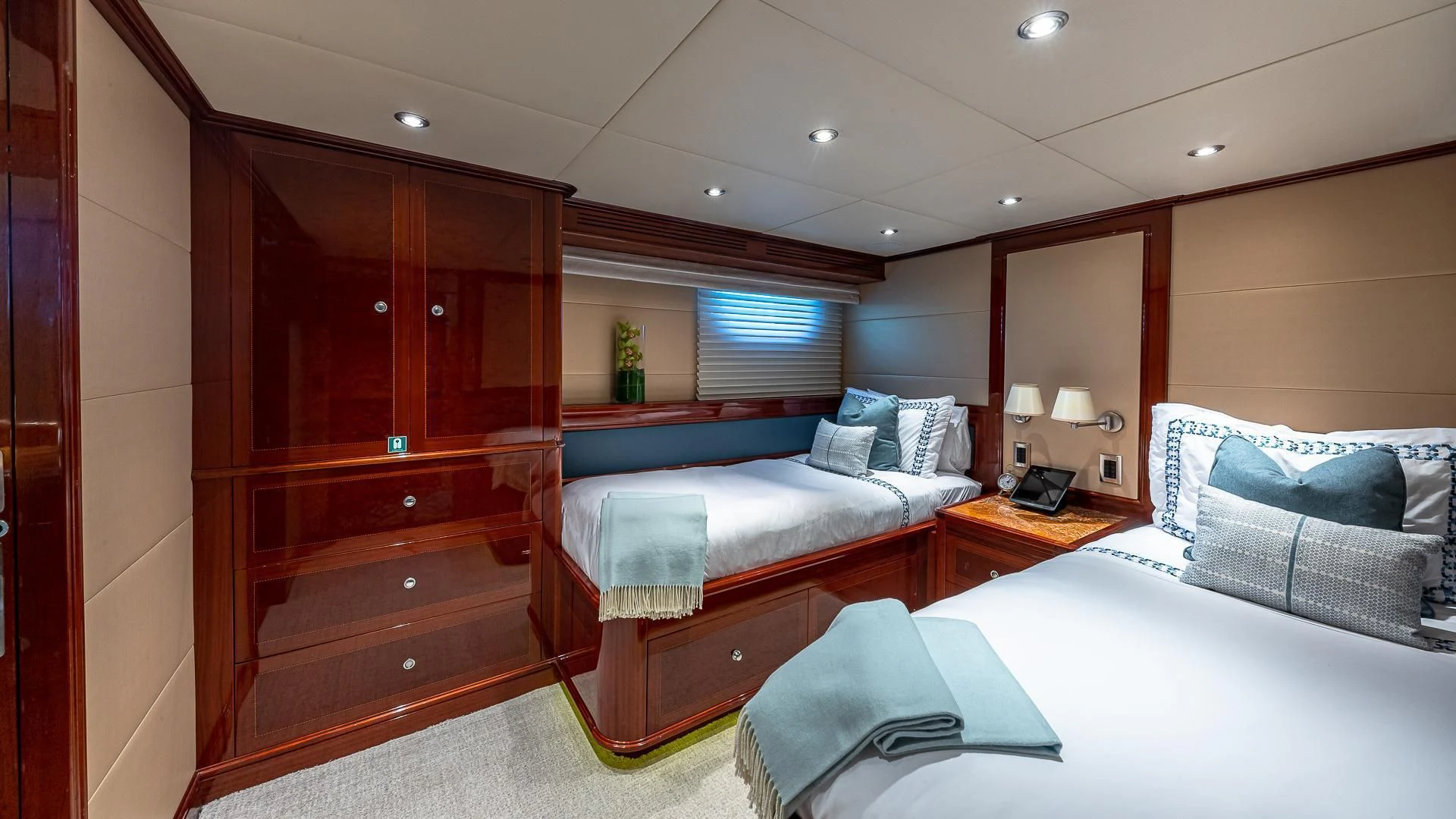 a room with two beds aboard KASHMIR Yacht for Charter