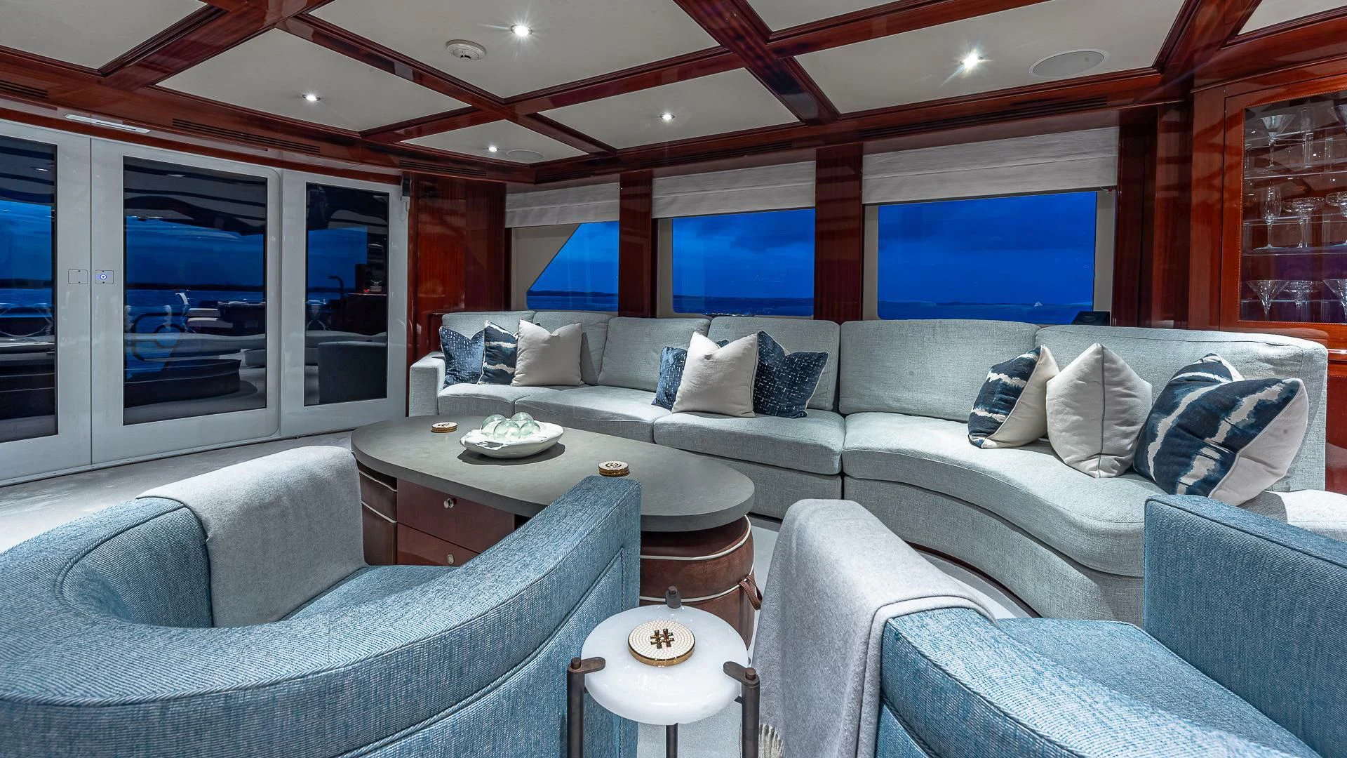 a living room with a couch and a table aboard KASHMIR Yacht for Charter