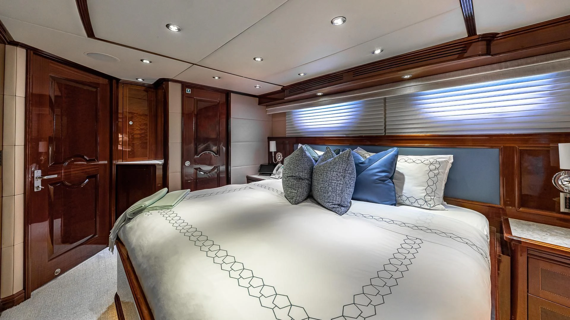 a bed in a room aboard KASHMIR Yacht for Charter
