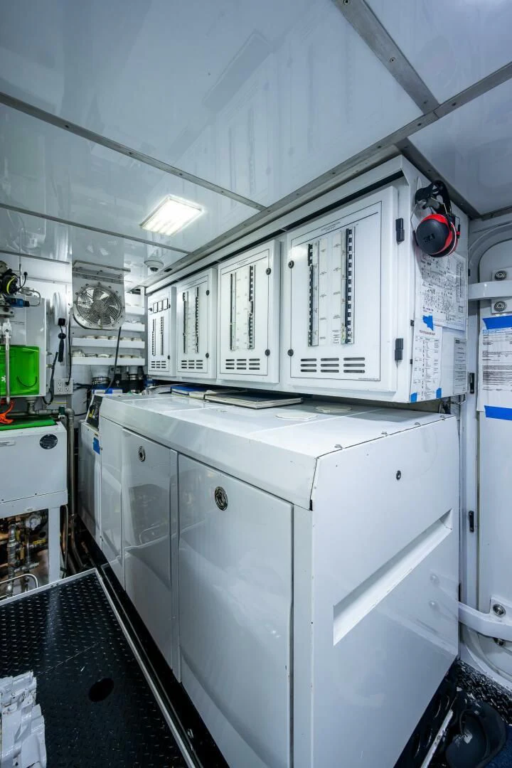 a machine in a room aboard KASHMIR Yacht for Charter