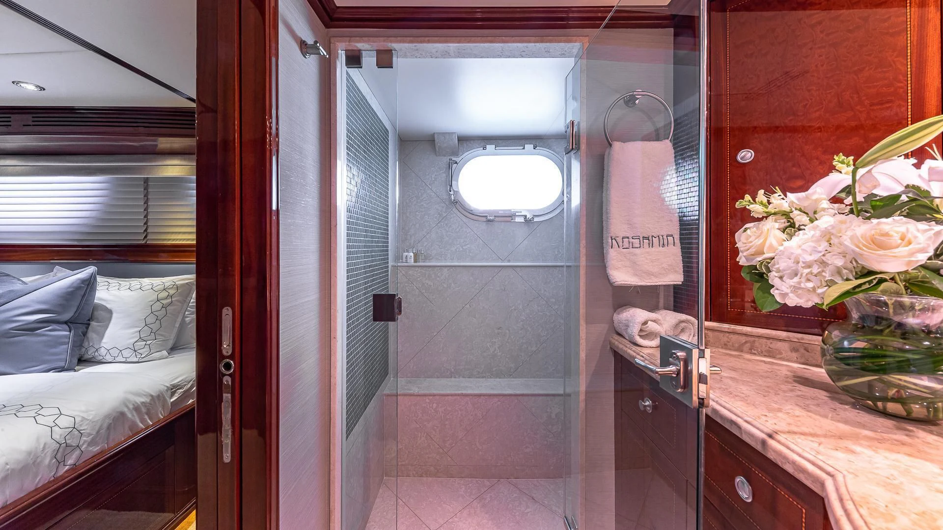a bathroom with a sink and a mirror aboard KASHMIR Yacht for Charter