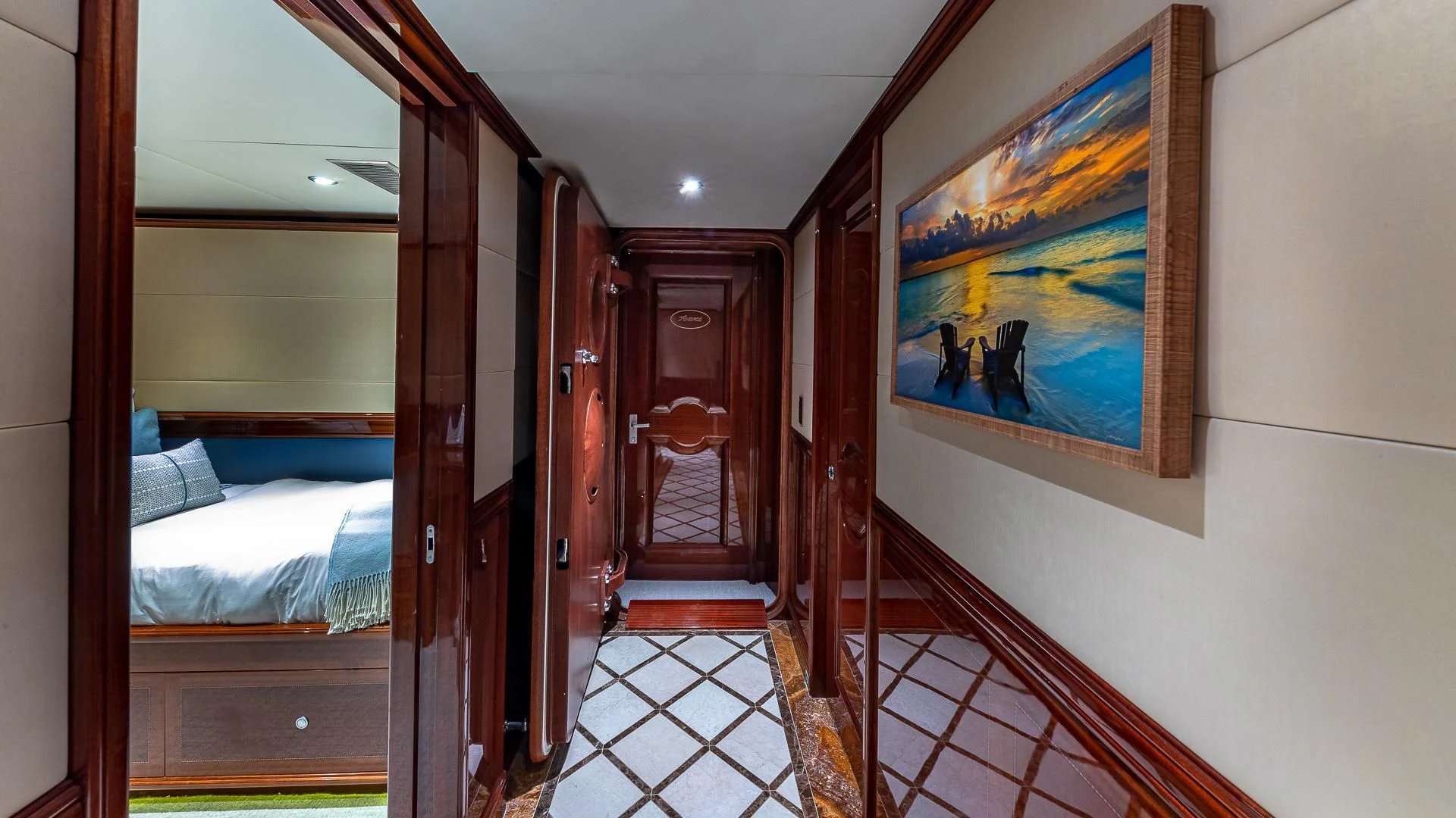 a hallway with a painting on the wall aboard KASHMIR Yacht for Charter