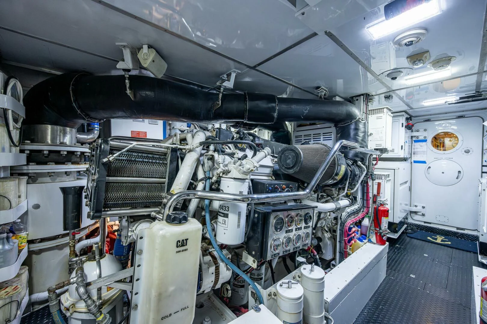 a large machine in a room aboard KASHMIR Yacht for Charter