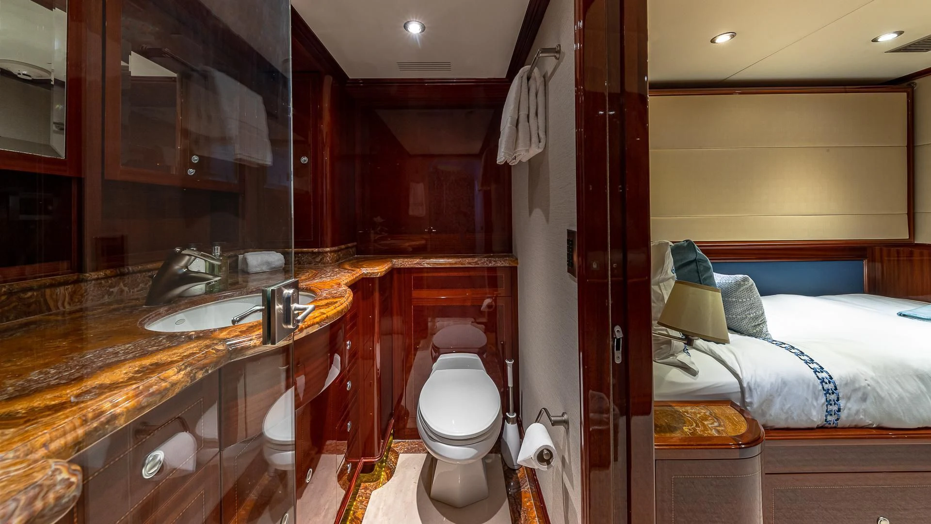 a bathroom with a toilet and a sink aboard KASHMIR Yacht for Charter