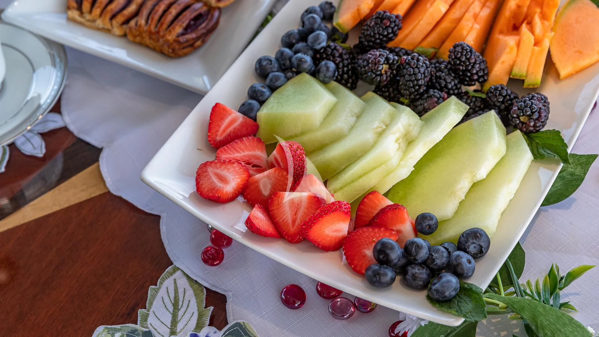 a plate of fruits aboard KASHMIR Yacht for Charter