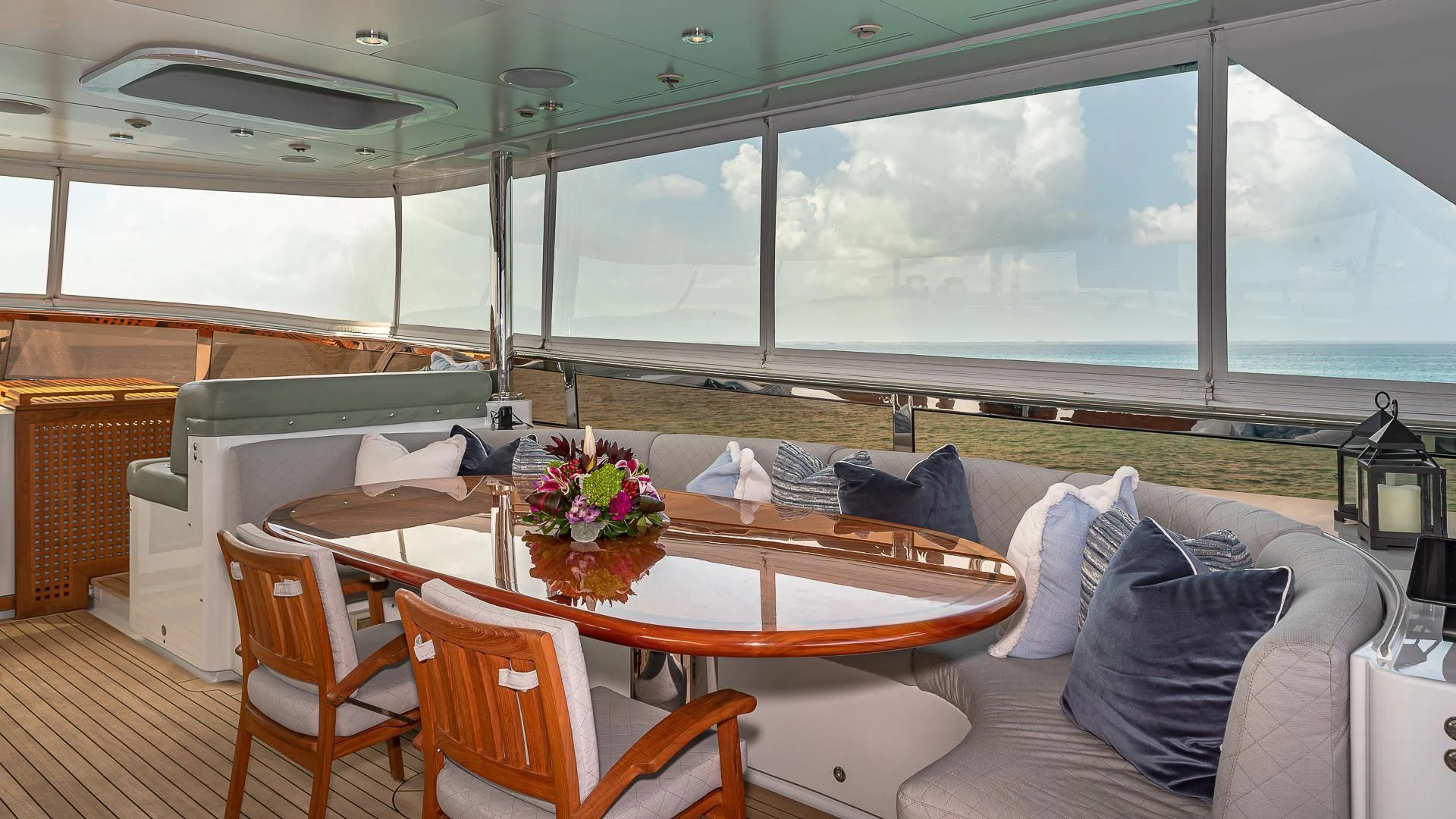 a room with a table and chairs aboard KASHMIR Yacht for Charter