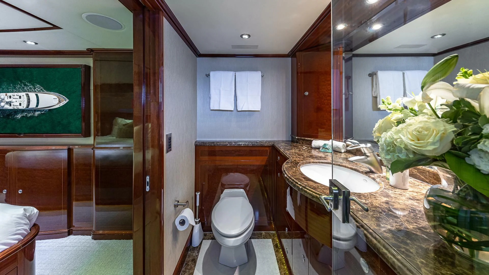 a bathroom with a sink and a toilet aboard KASHMIR Yacht for Charter