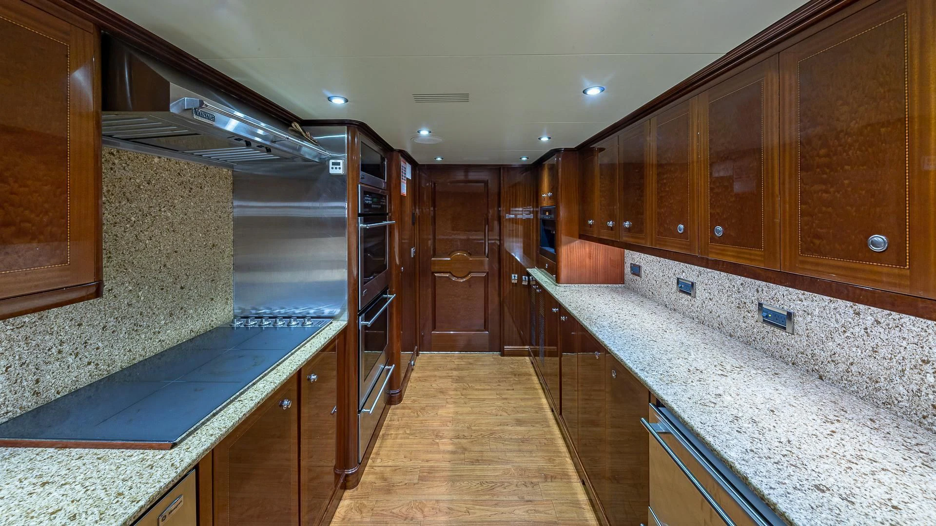 a kitchen with a marble counter top aboard KASHMIR Yacht for Charter