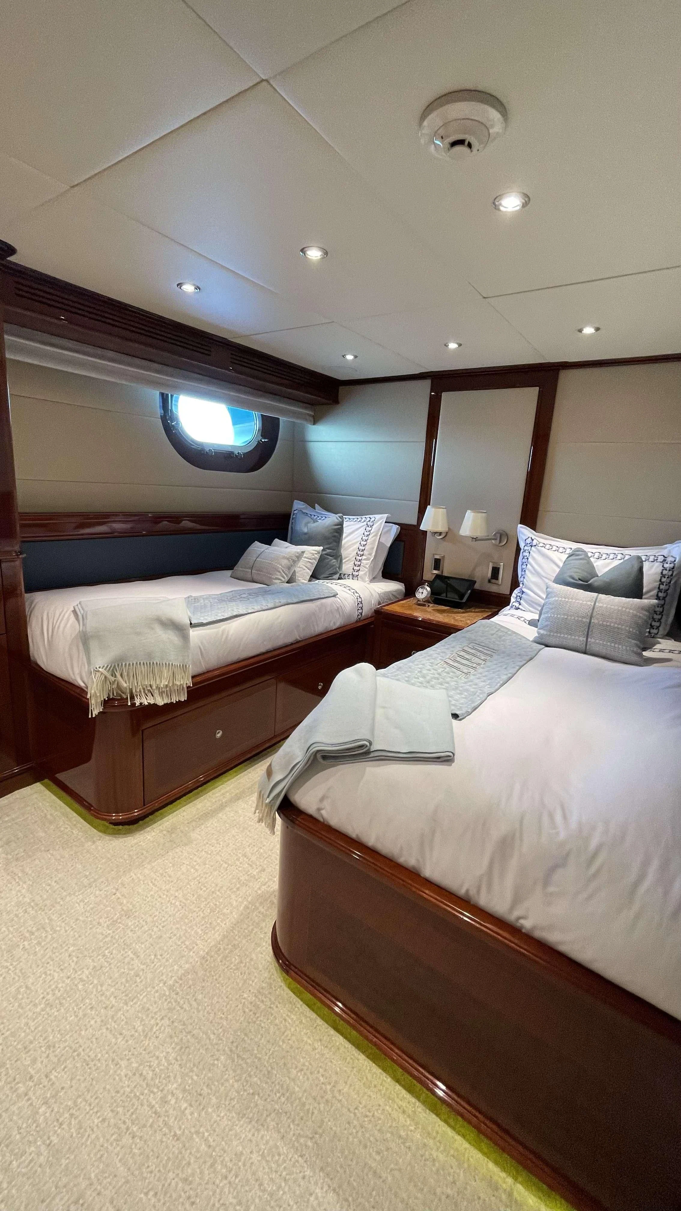 a room with two beds aboard KASHMIR Yacht for Charter