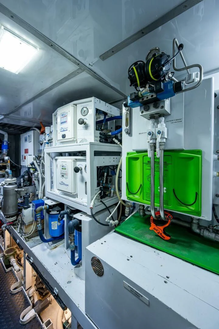 a machine with a green lid aboard KASHMIR Yacht for Charter