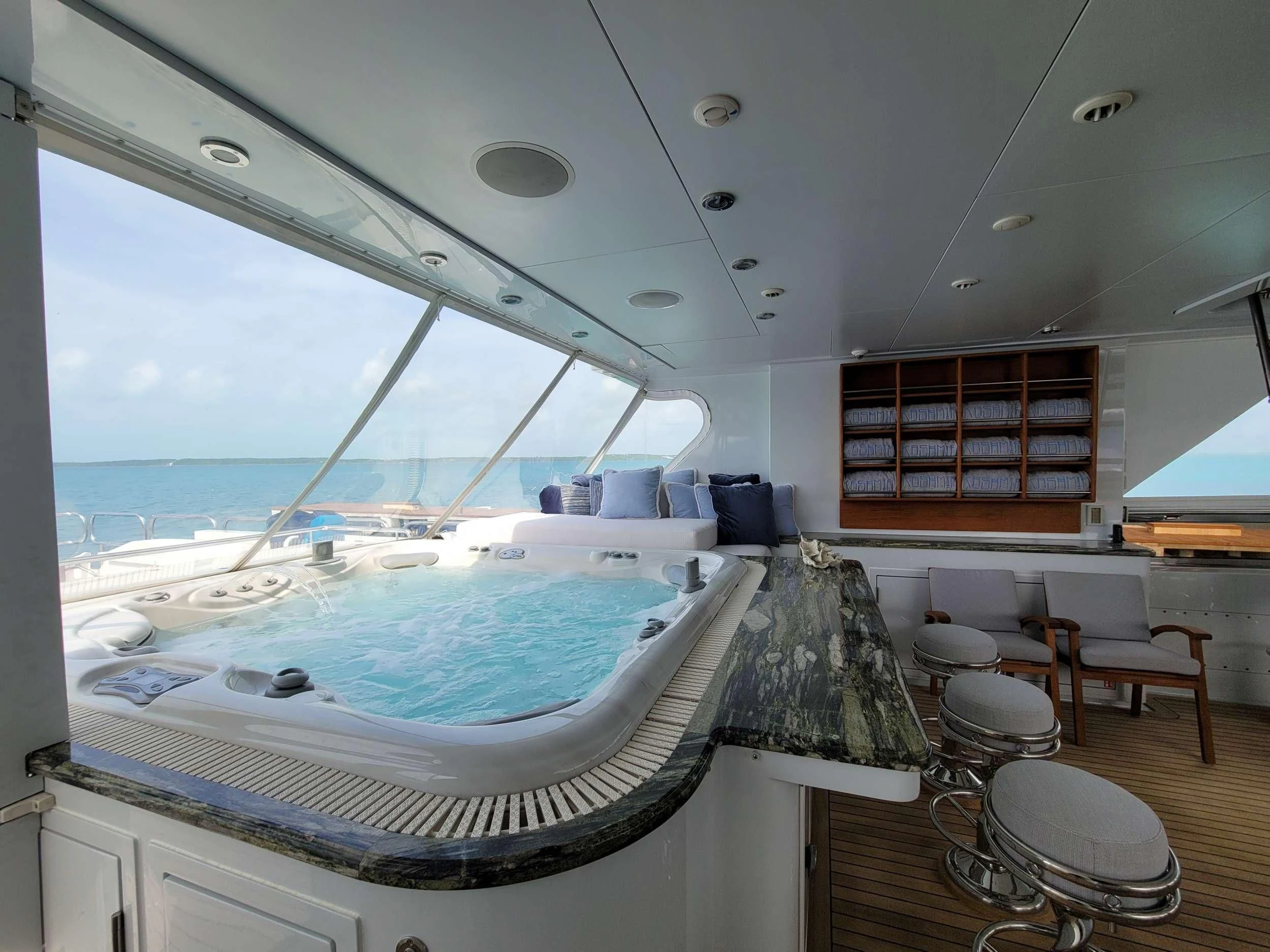 a large room with a large bed aboard KASHMIR Yacht for Charter