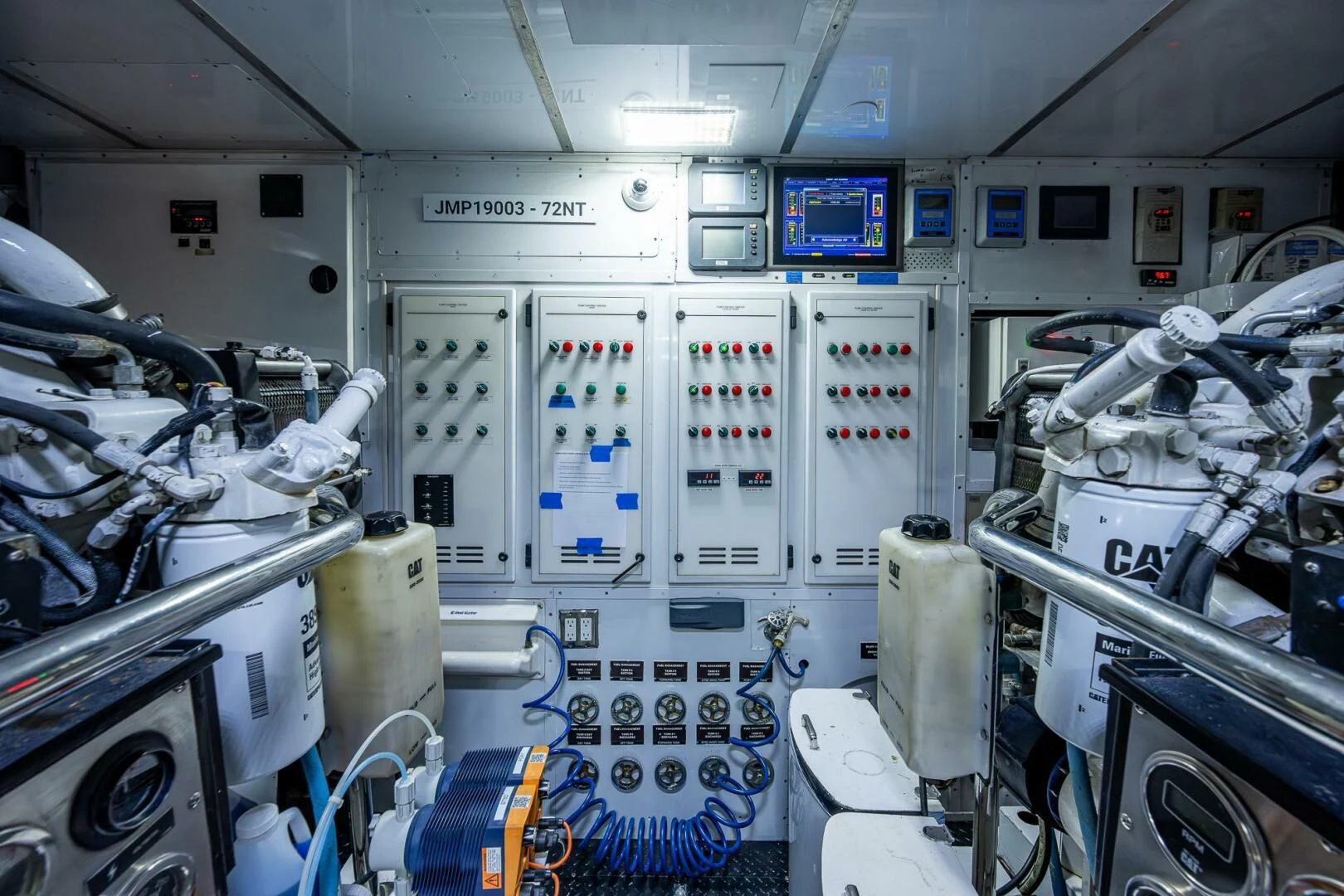 a room with machines and equipment aboard KASHMIR Yacht for Charter
