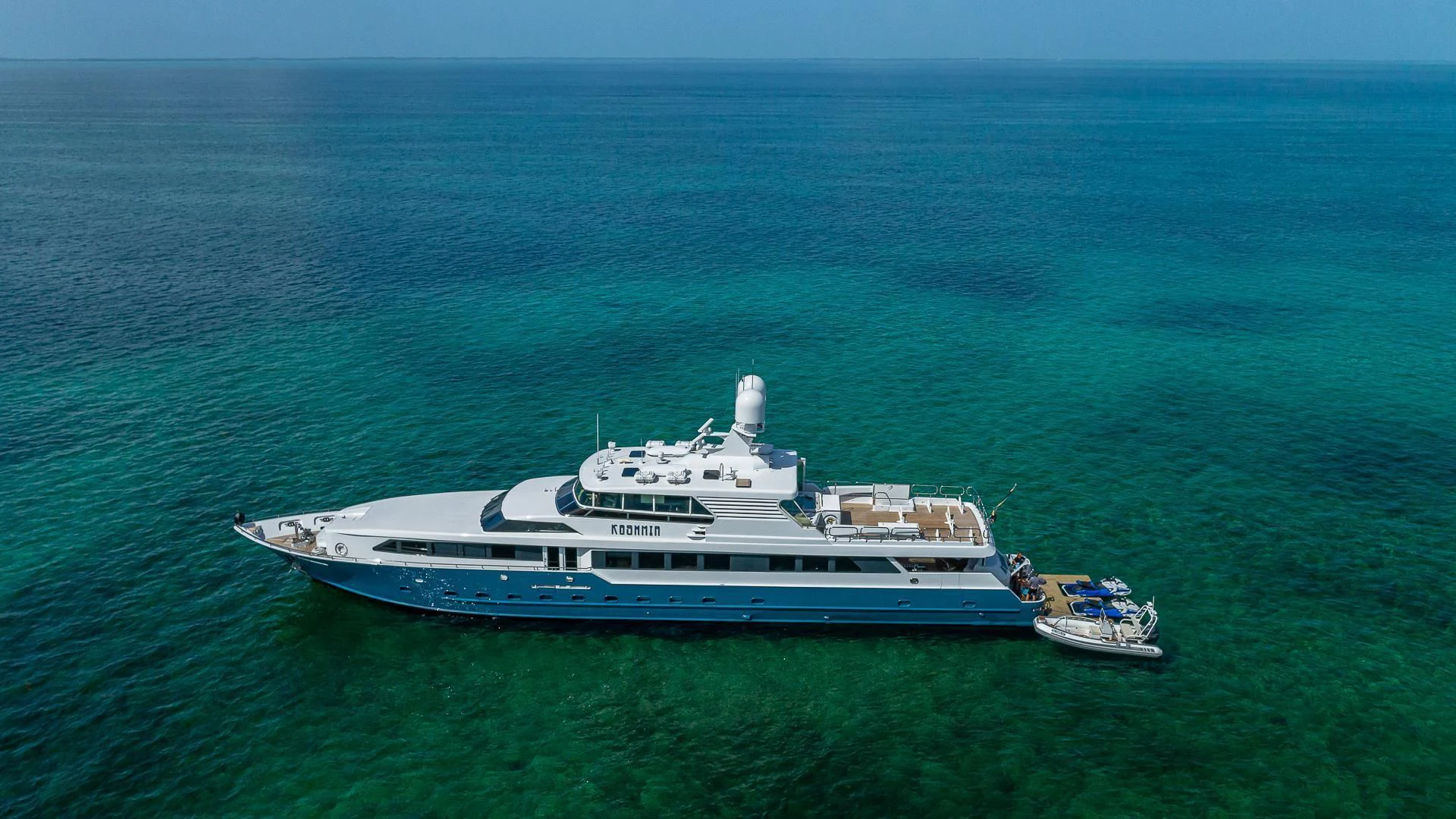 a large ship in the ocean aboard KASHMIR Yacht for Charter