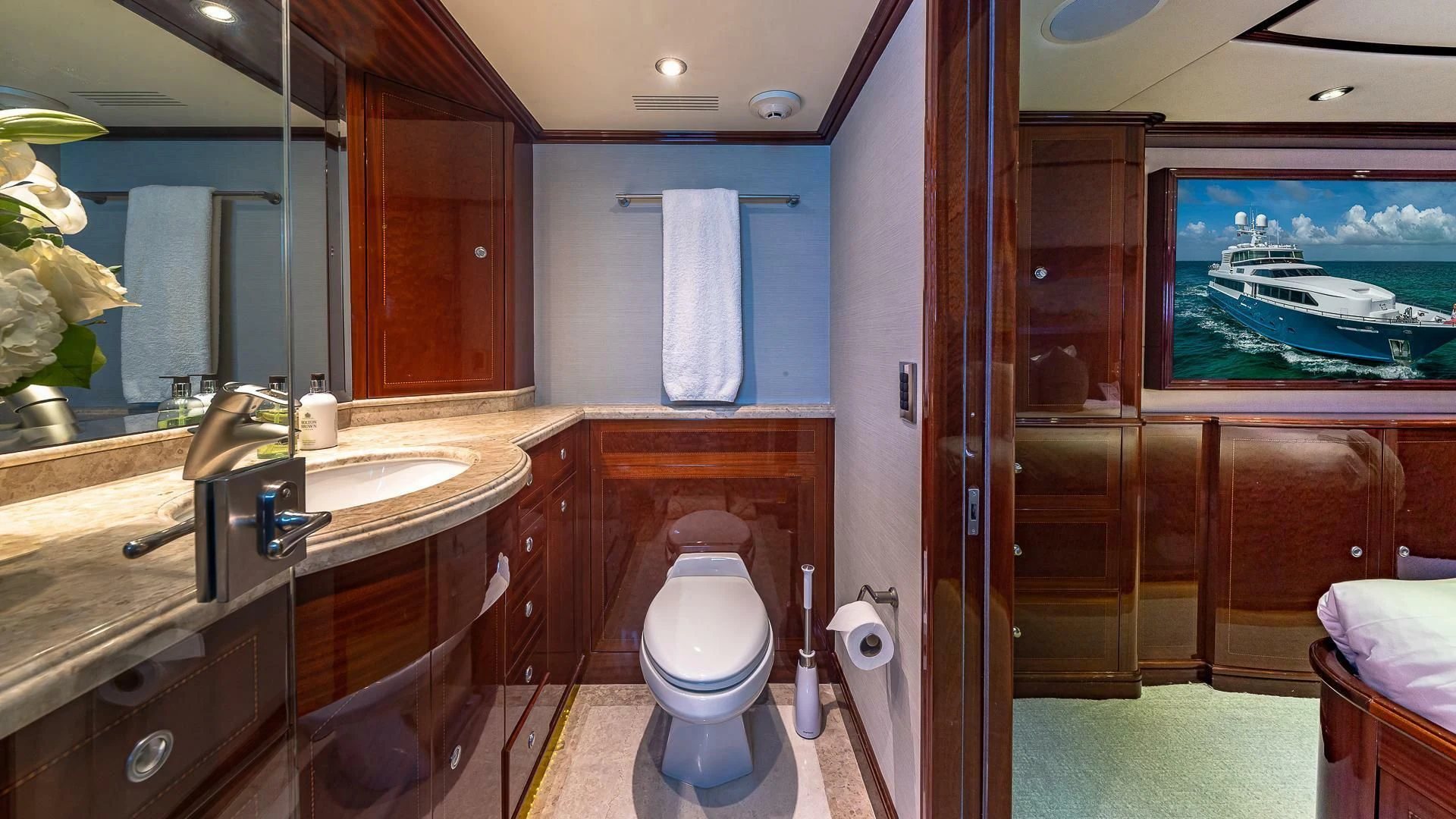 a bathroom with a large mirror aboard KASHMIR Yacht for Charter