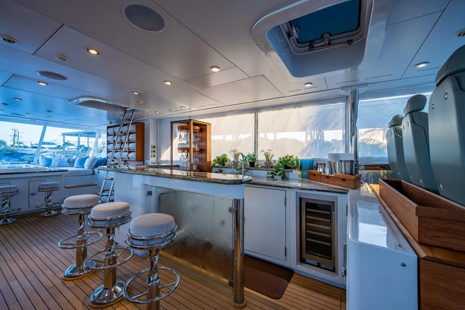 a kitchen with stools and stools aboard KASHMIR Yacht for Charter