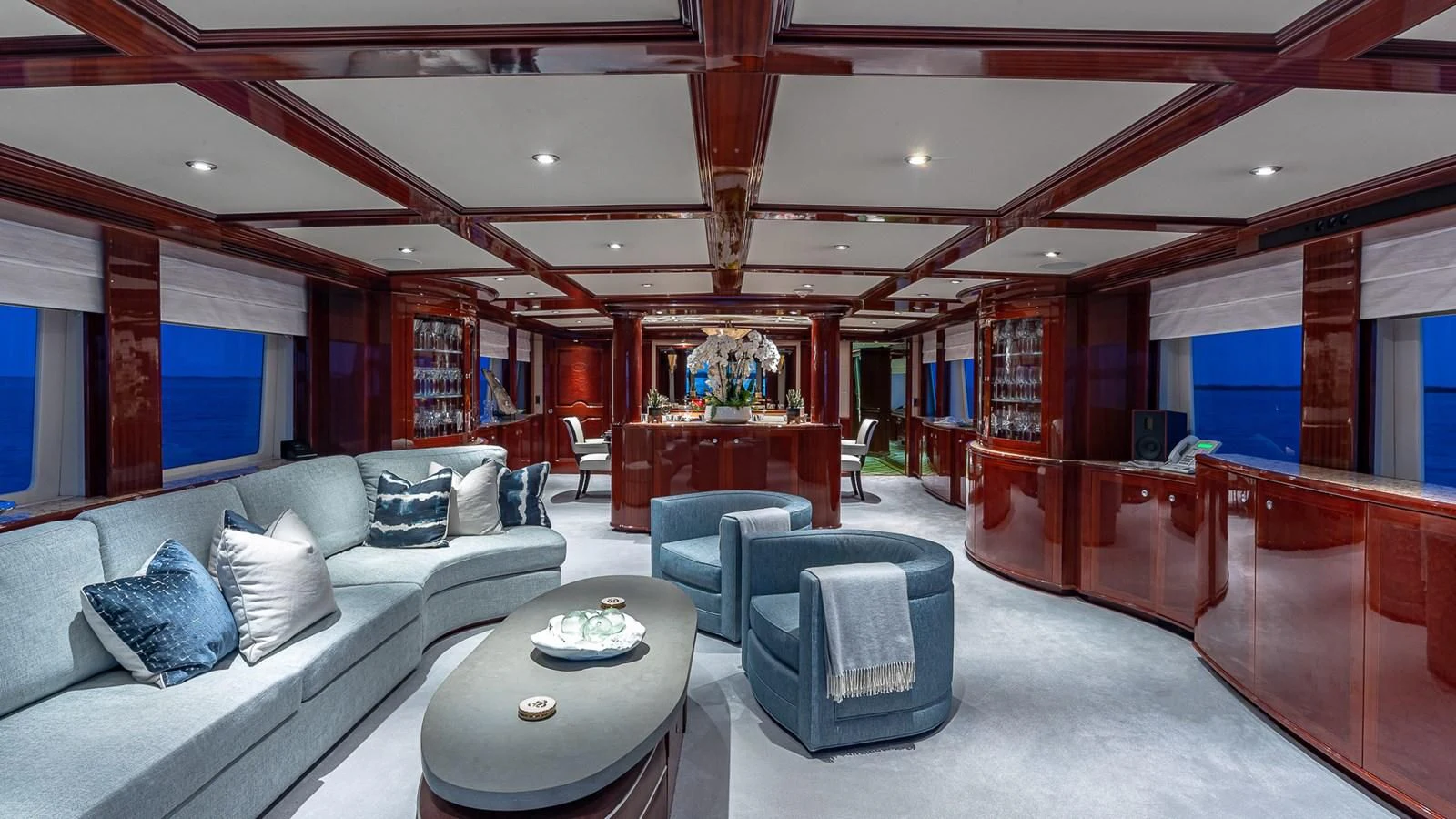 a living room with a couch and a table aboard KASHMIR Yacht for Charter
