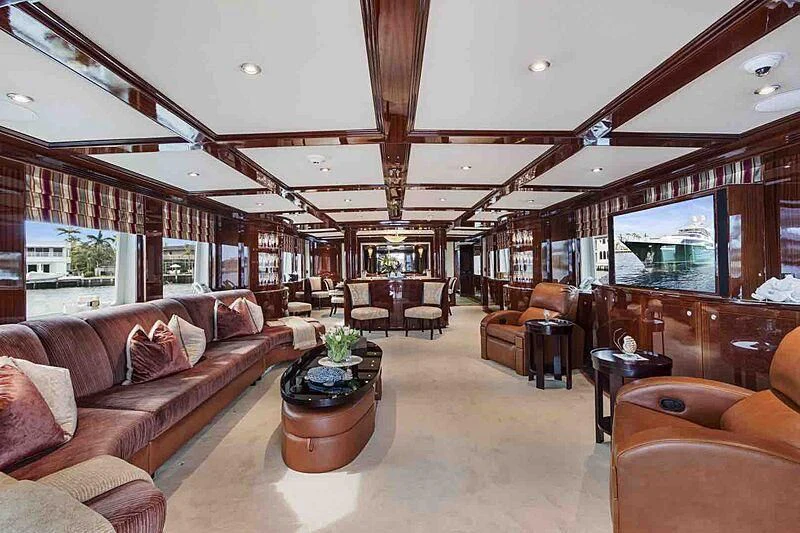 a living room with a large window aboard KASHMIR Yacht for Charter