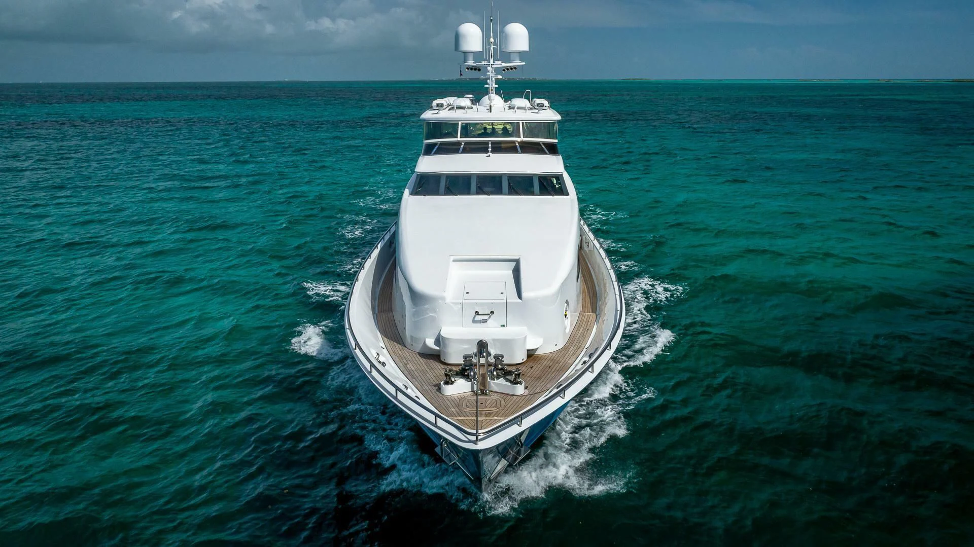 a white boat in the water aboard KASHMIR Yacht for Charter