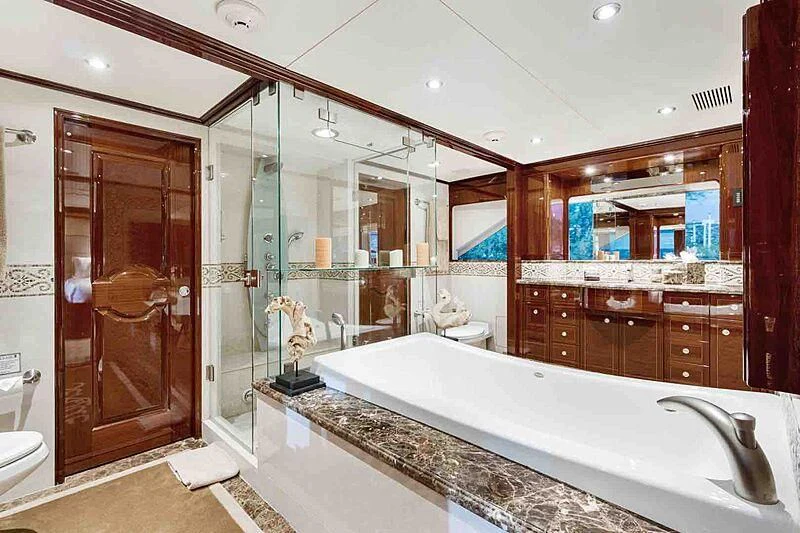 a bathroom with a large bathtub aboard KASHMIR Yacht for Charter