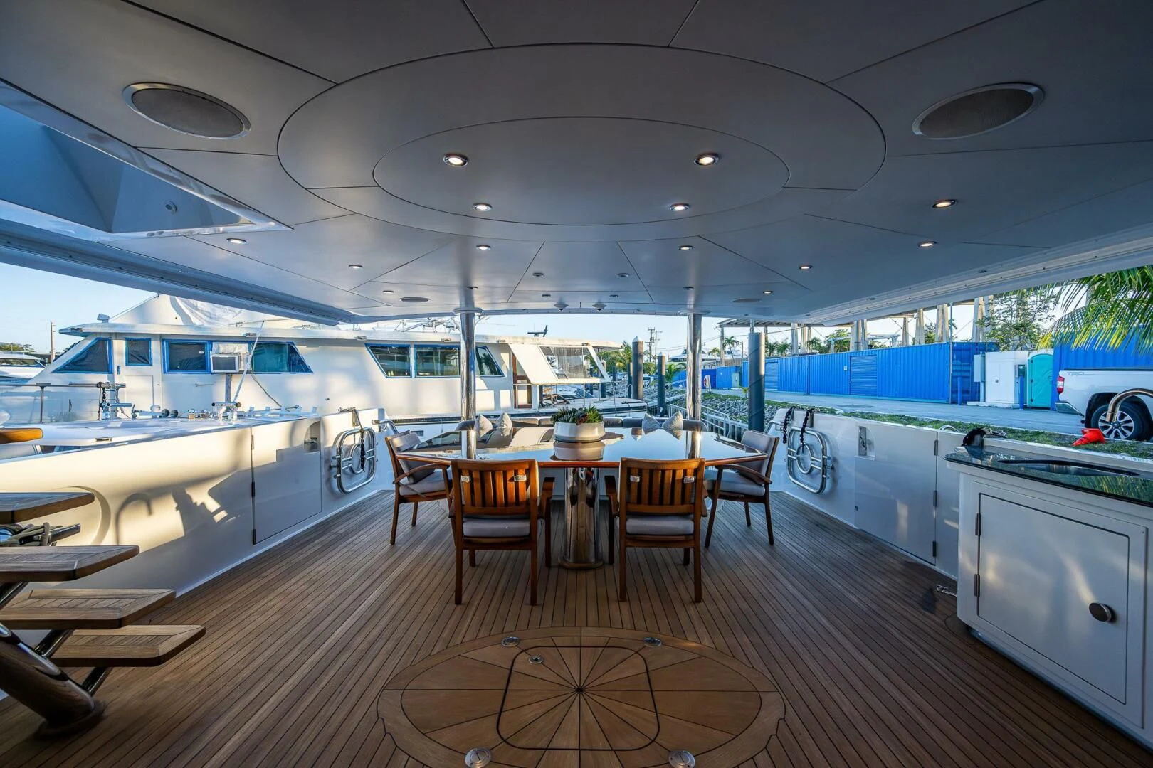 a large kitchen with a table and chairs aboard KASHMIR Yacht for Charter