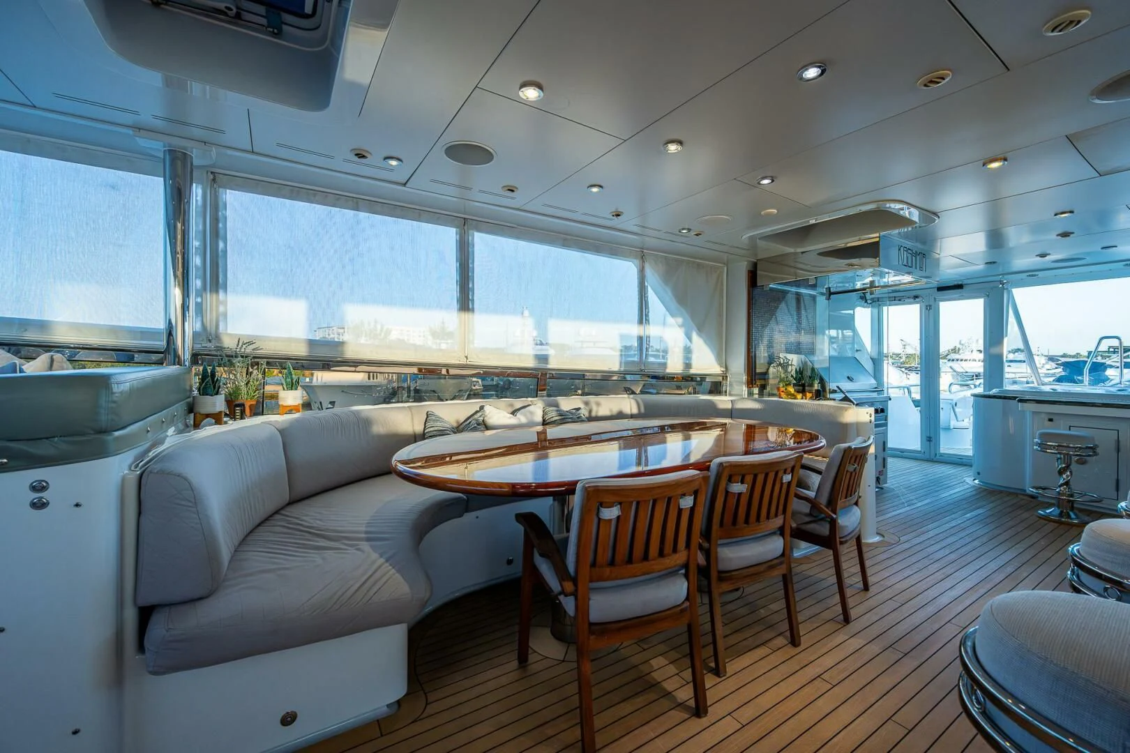 a kitchen and dining area aboard KASHMIR Yacht for Charter