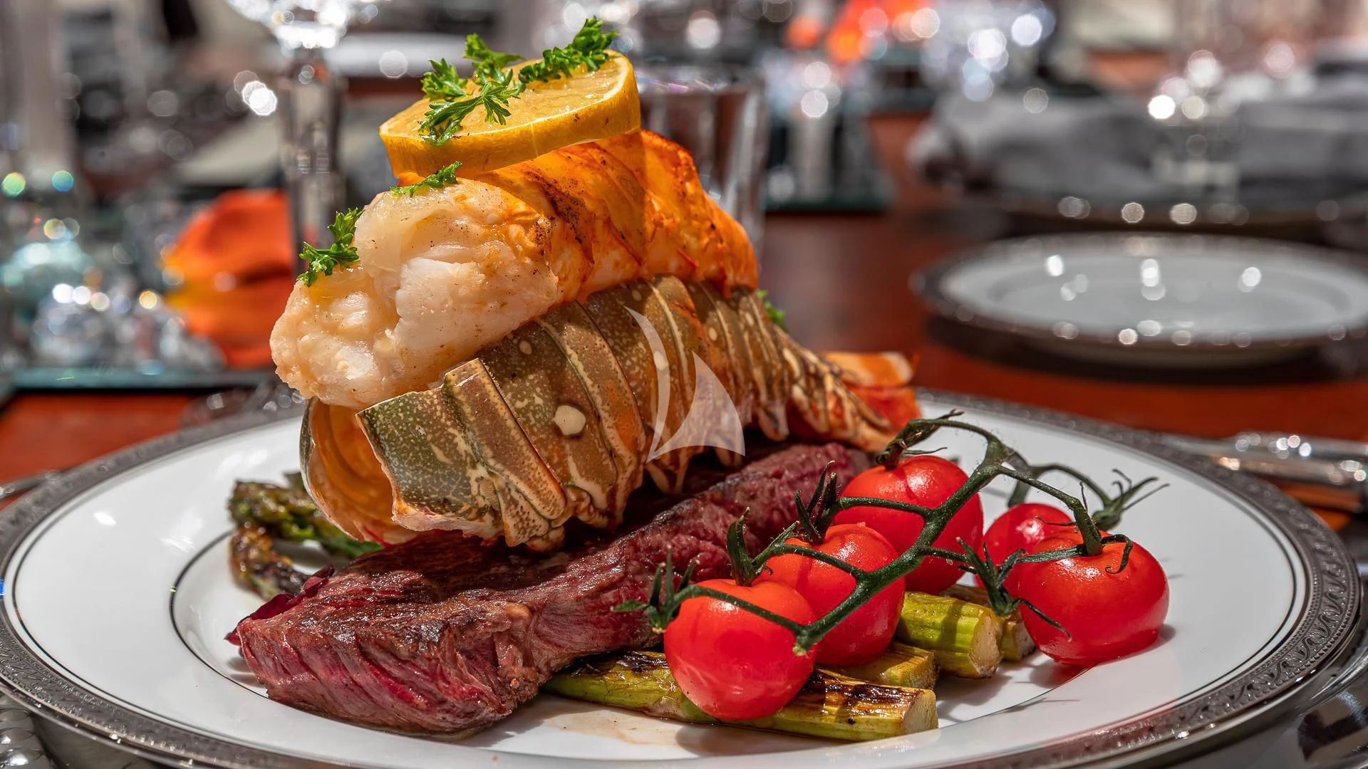 a plate of food aboard KASHMIR Yacht for Charter