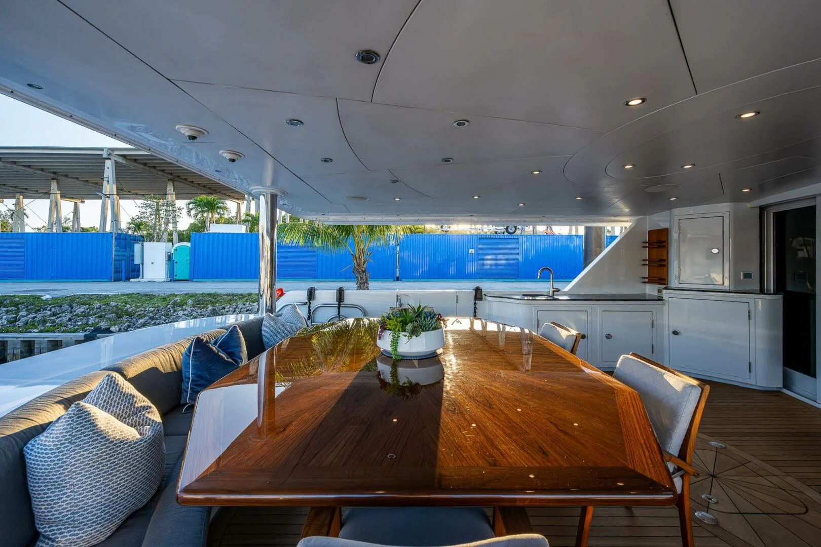 a large table in a room aboard KASHMIR Yacht for Charter