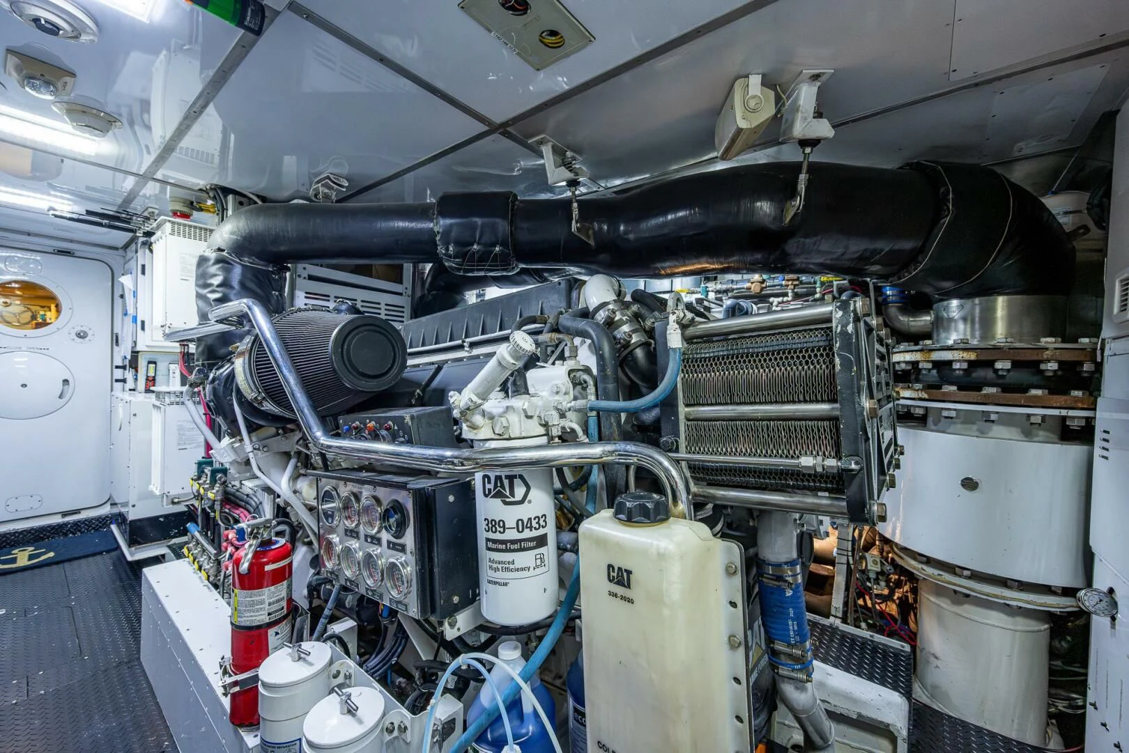 a car engine with a lot of wires aboard KASHMIR Yacht for Charter