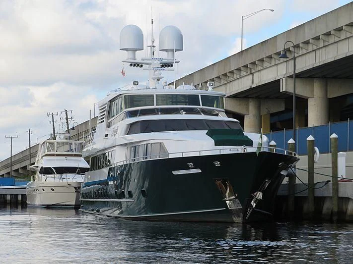 a boat docked at a pier aboard KASHMIR Yacht for Charter
