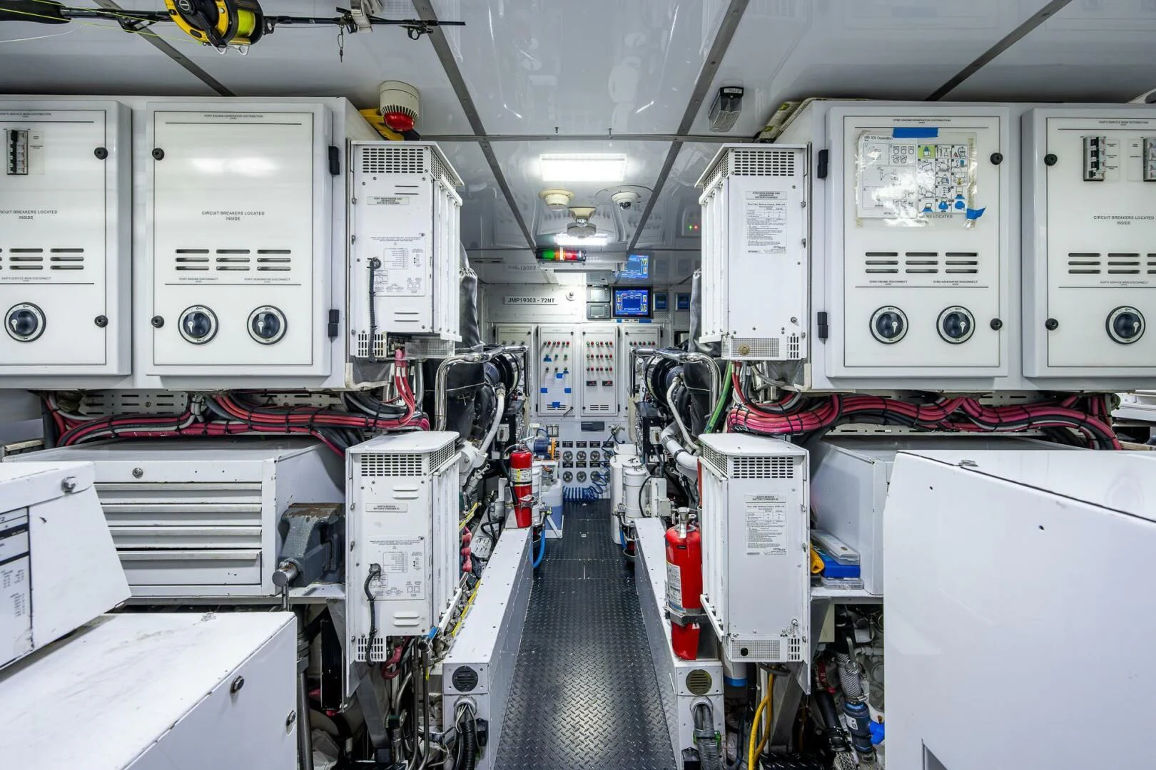 a room with several white machines aboard KASHMIR Yacht for Charter