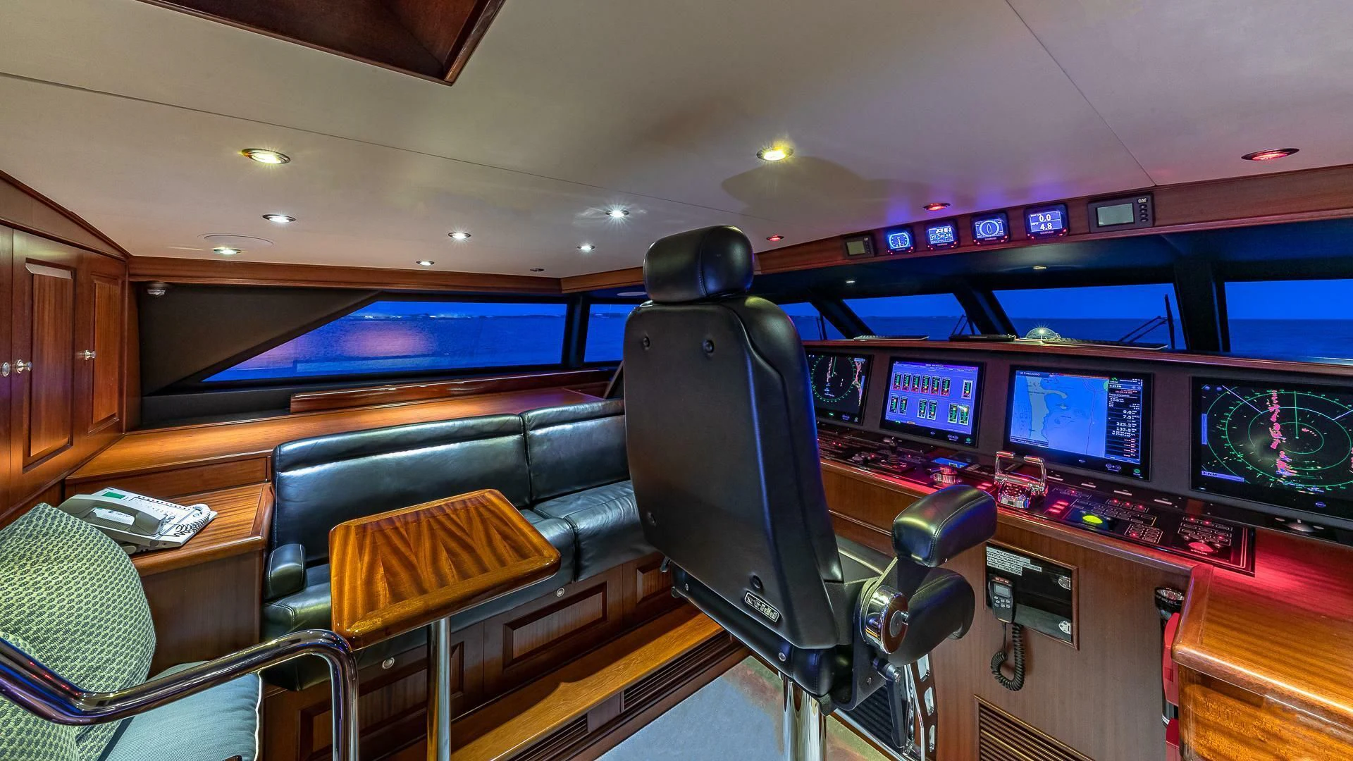 inside of a vehicle with monitors and screens aboard KASHMIR Yacht for Charter