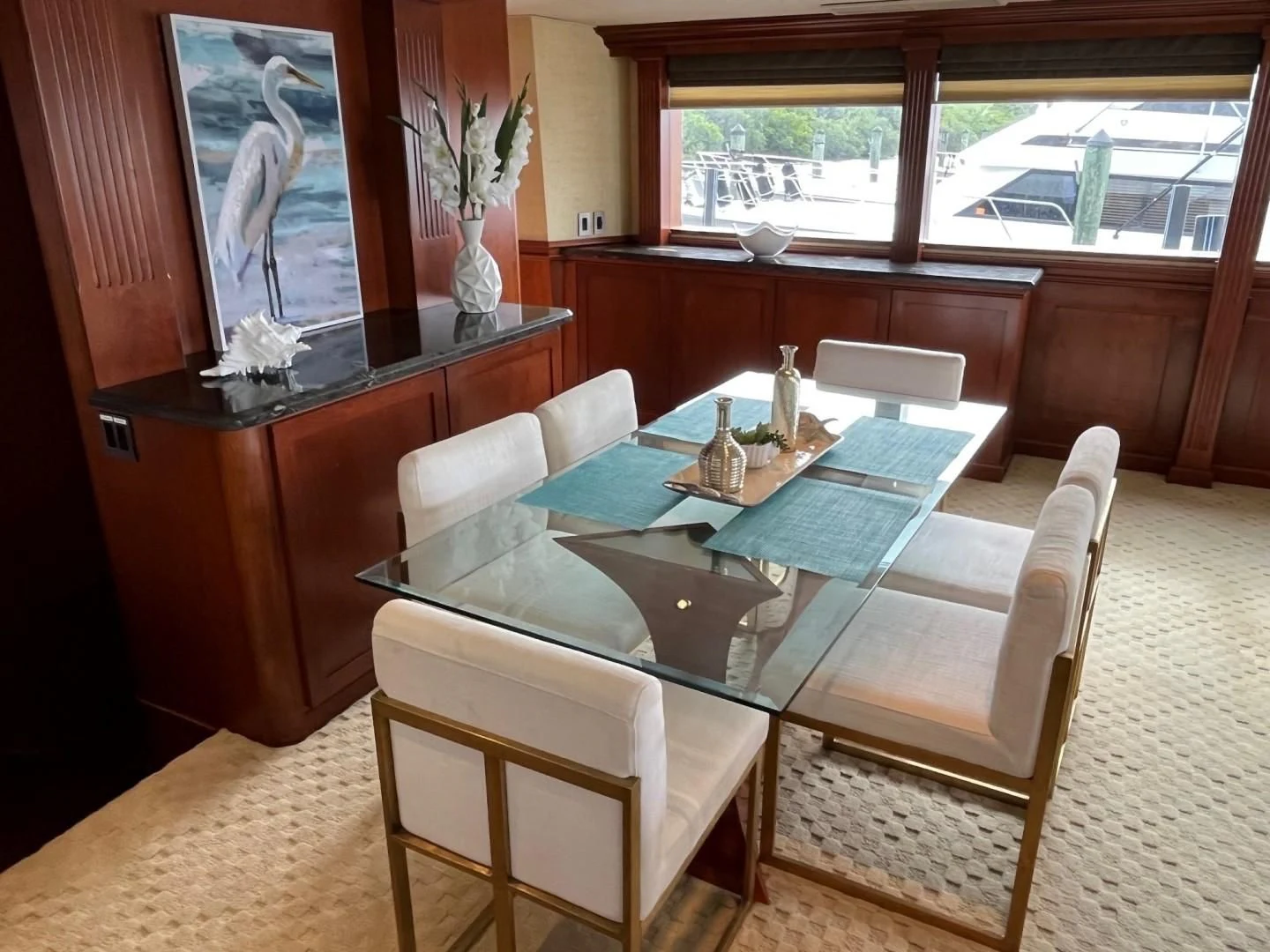 a dining room with a table and chairs aboard SEAQUEST Yacht for Sale