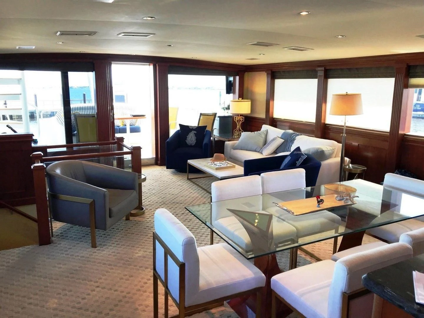 a living room with a couch and a table aboard SEAQUEST Yacht for Sale
