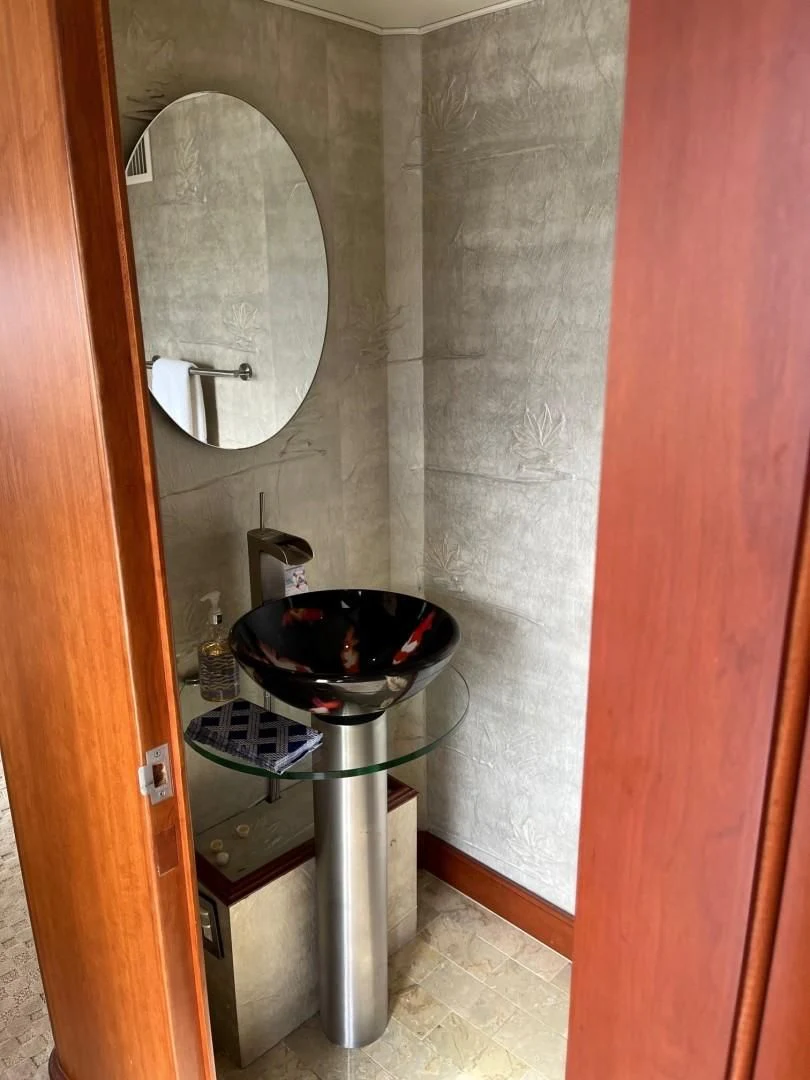 a sink in a bathroom aboard SEAQUEST Yacht for Sale