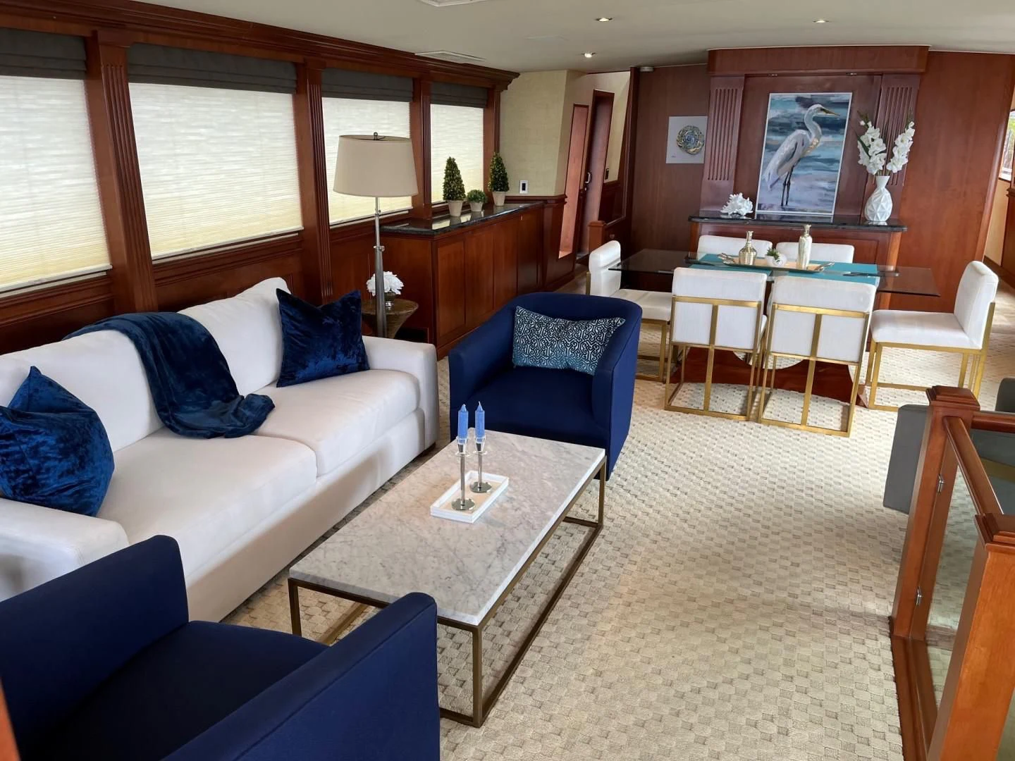 a living room with a couch and a table aboard SEAQUEST Yacht for Sale