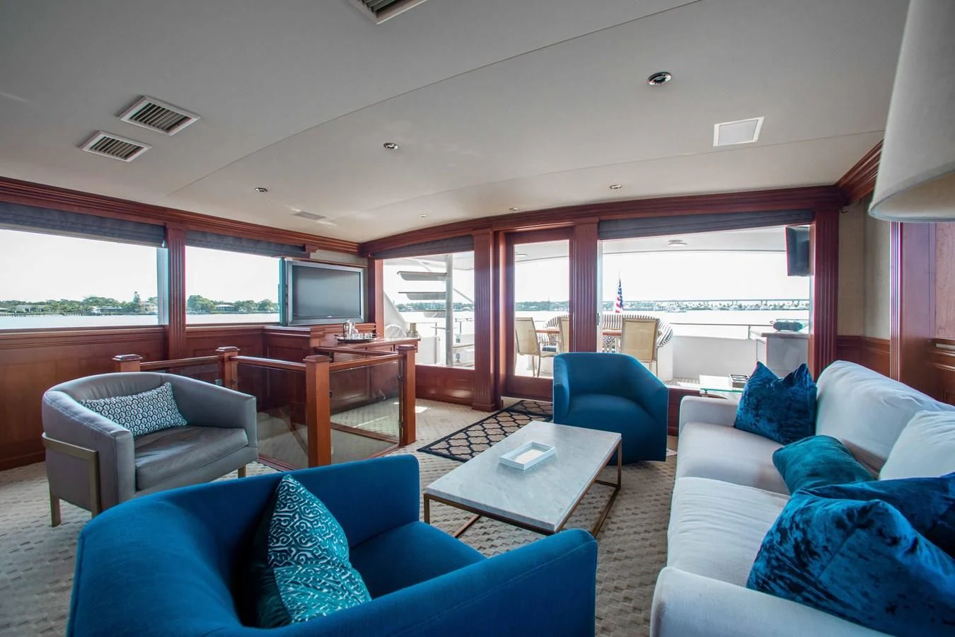 a living room with a couch and a coffee table aboard SEAQUEST Yacht for Sale