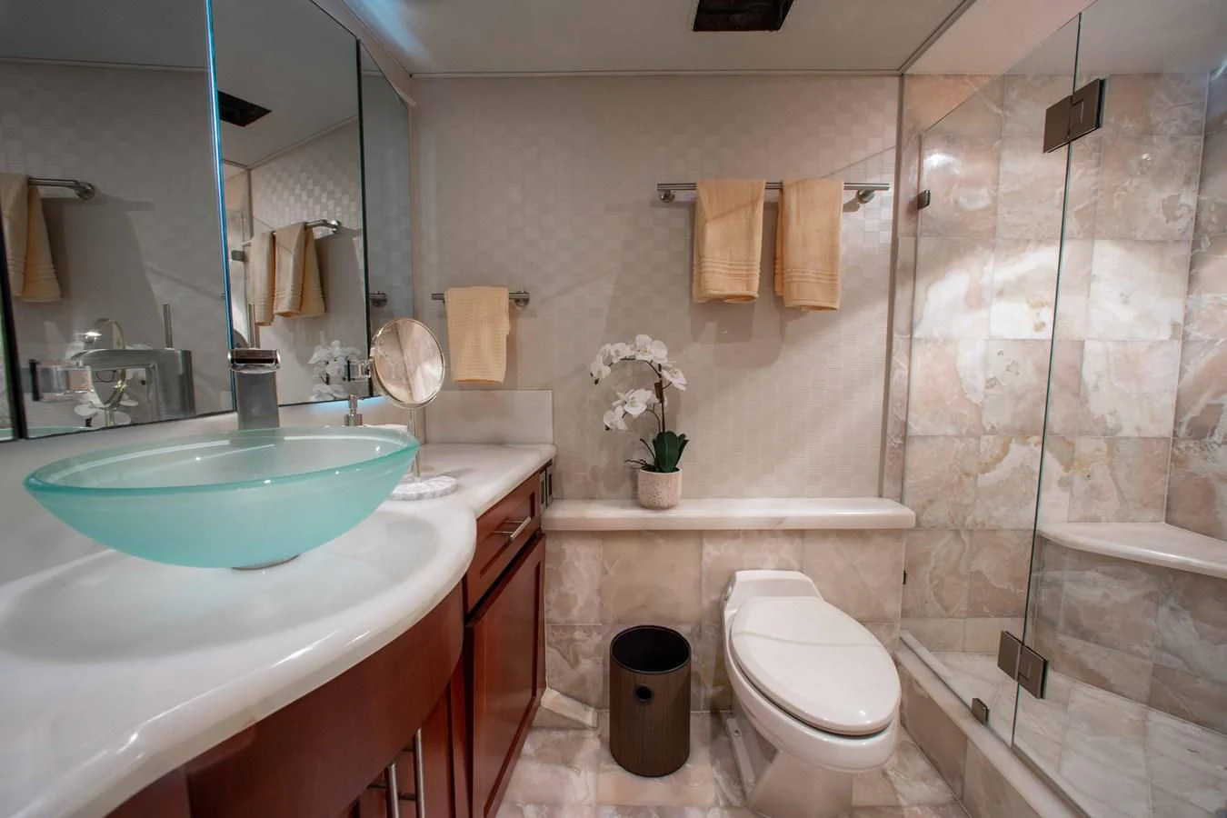 a bathroom with a sink toilet and a bathtub aboard SEAQUEST Yacht for Sale