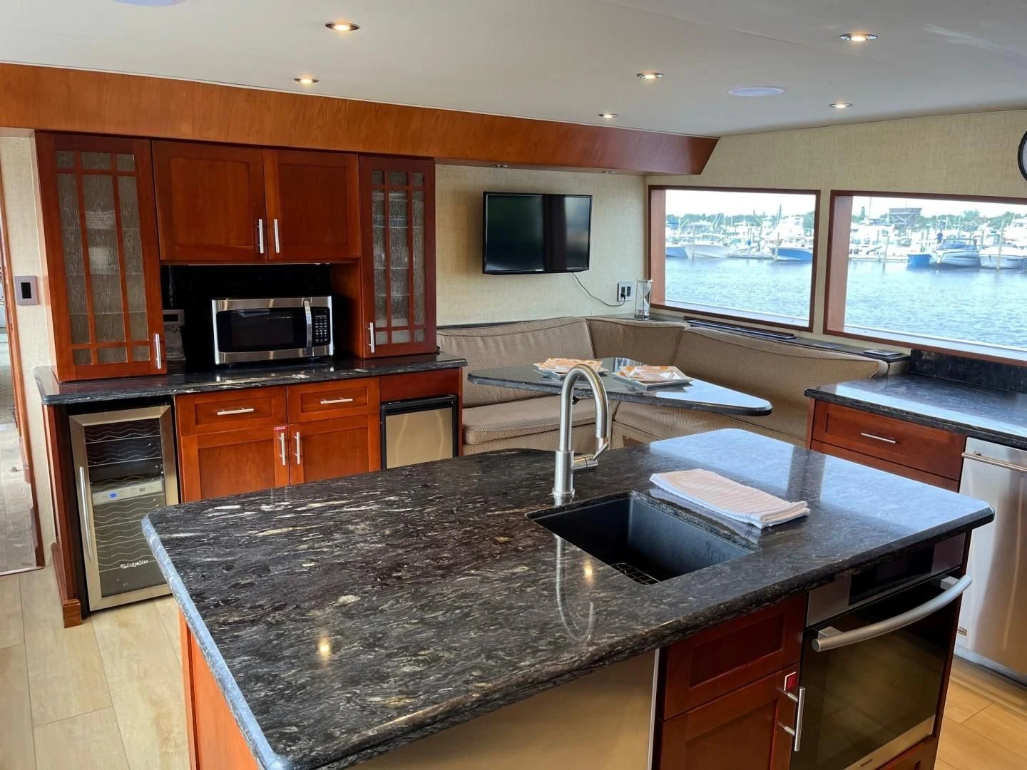 a kitchen with a large island aboard SEAQUEST Yacht for Sale