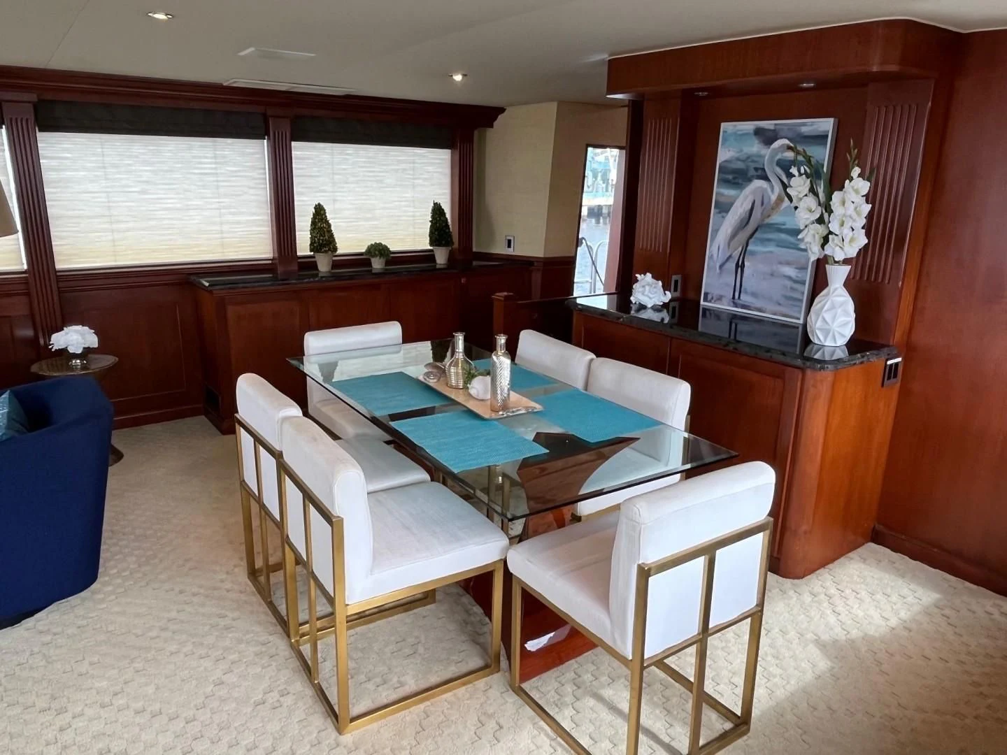 a dining room with a table and chairs aboard SEAQUEST Yacht for Sale