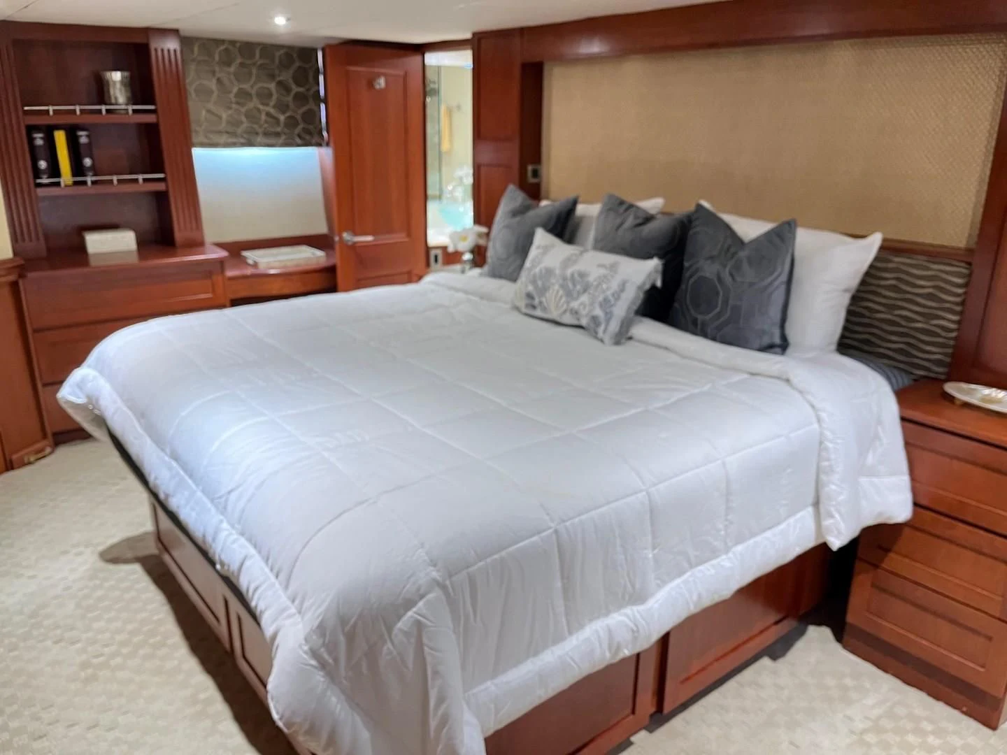 a bed with pillows aboard SEAQUEST Yacht for Sale