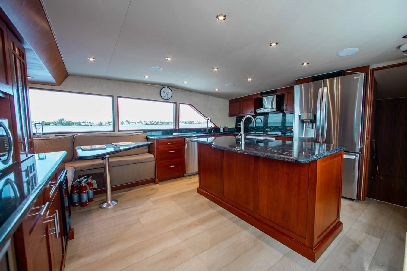 a kitchen with a large island aboard SEAQUEST Yacht for Sale