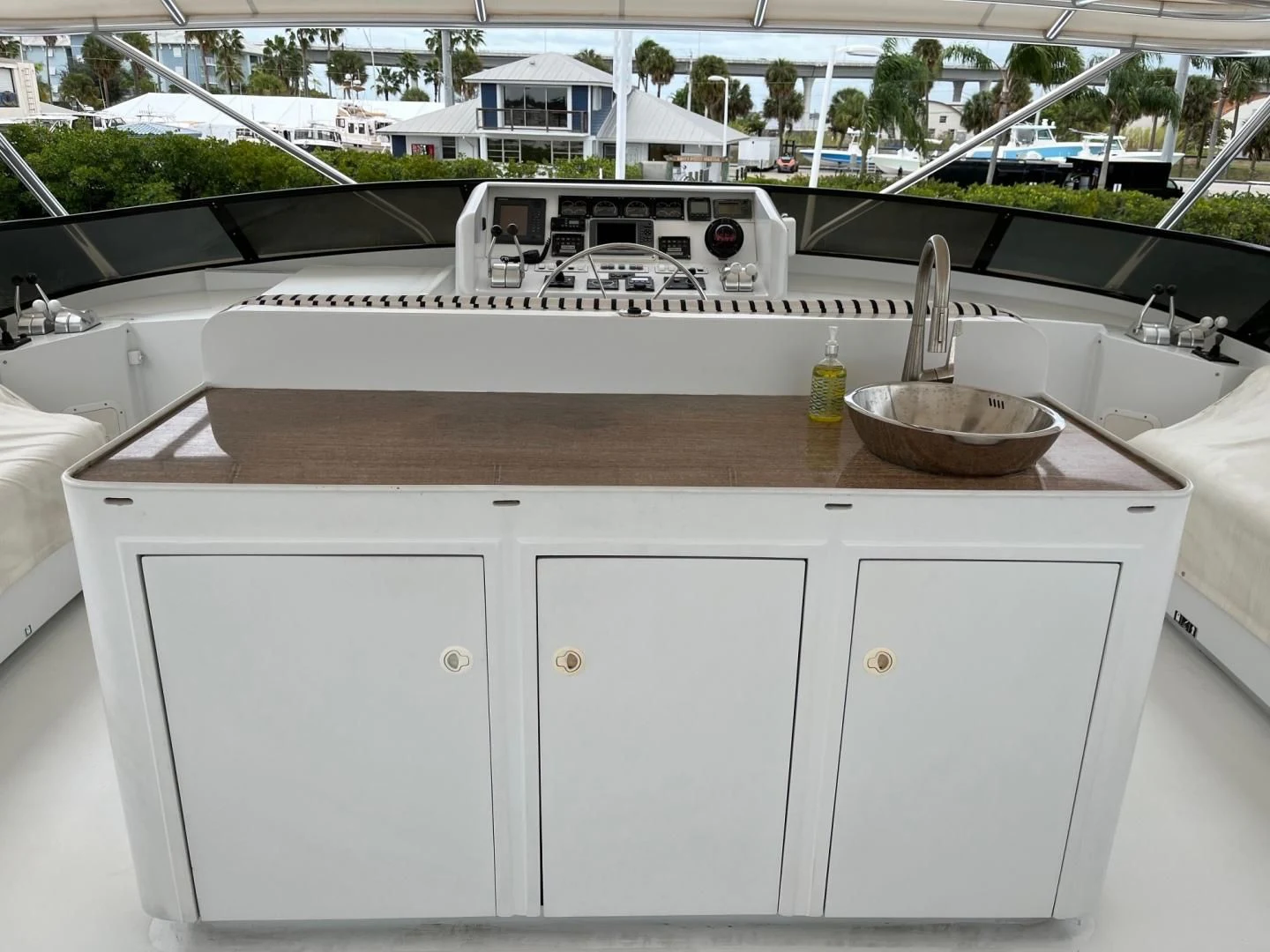 a kitchen with a sink and a large white countertop aboard SEAQUEST Yacht for Sale