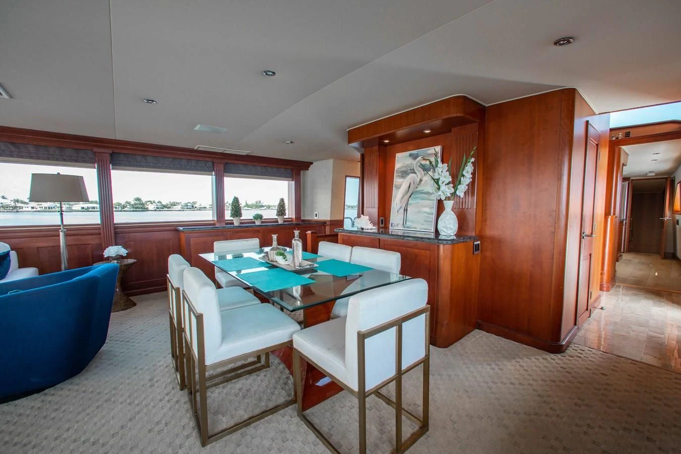 a dining room with a table and chairs aboard SEAQUEST Yacht for Sale