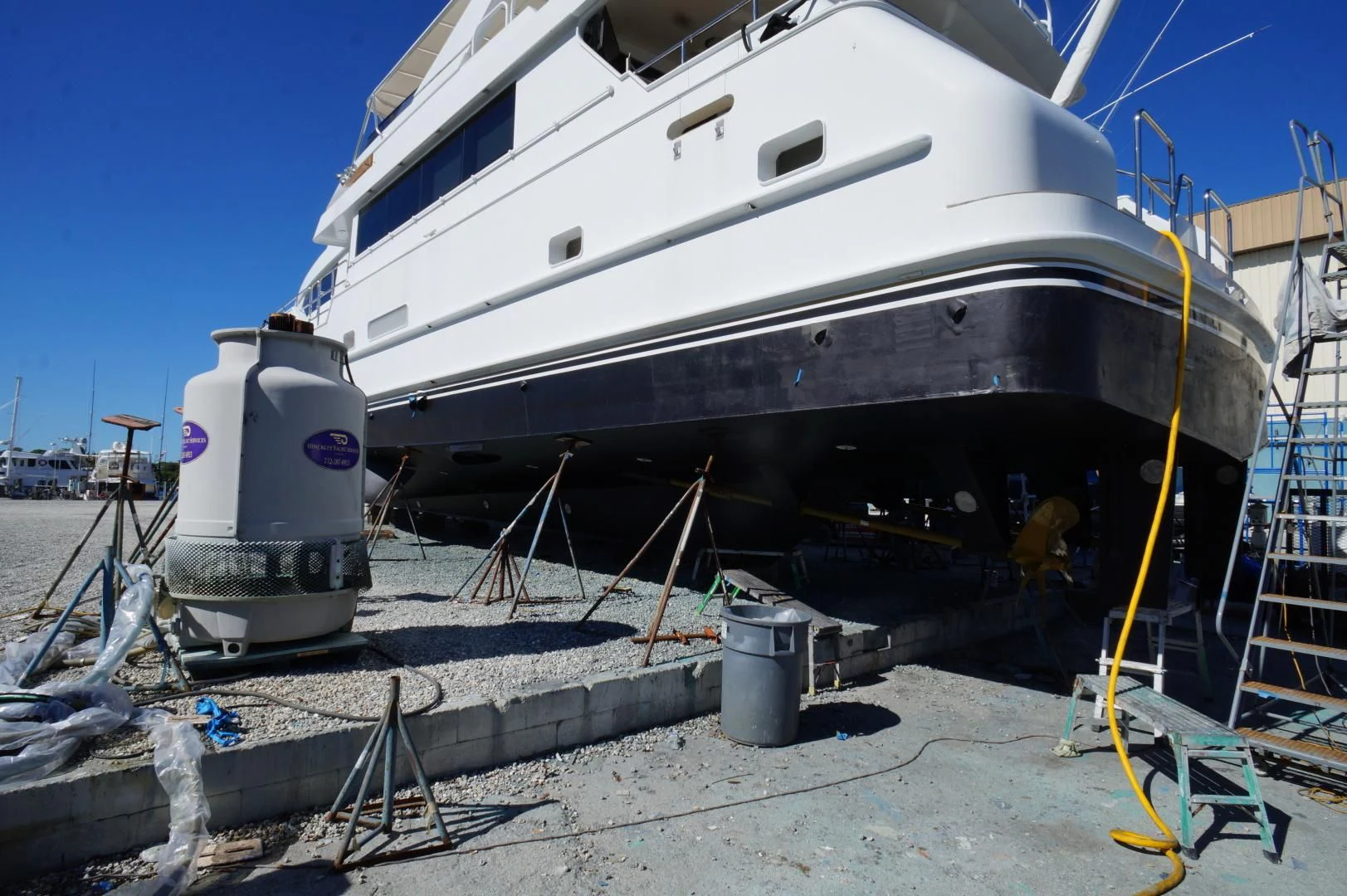 a large white boat with a large white ship on it aboard SEAQUEST Yacht for Sale