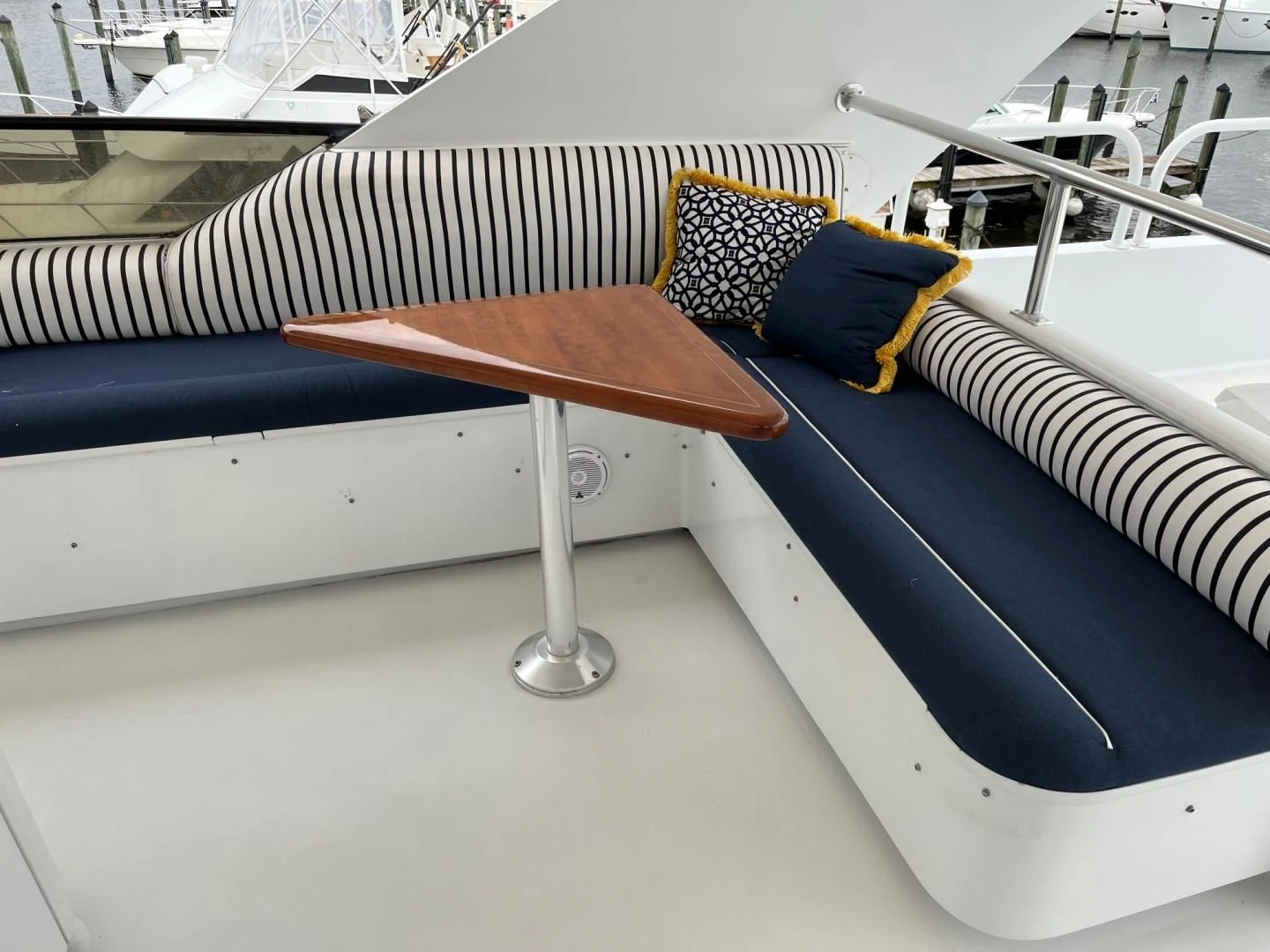 a table with a bench aboard SEAQUEST Yacht for Sale