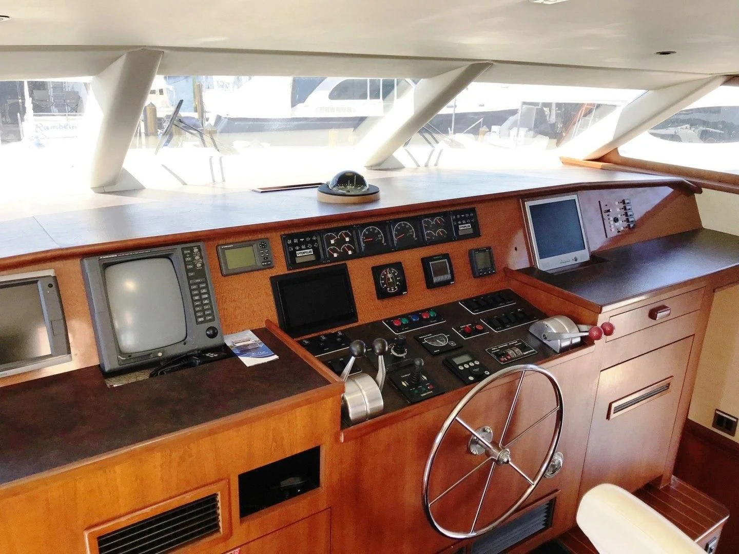 a small kitchen with a large window aboard SEAQUEST Yacht for Sale