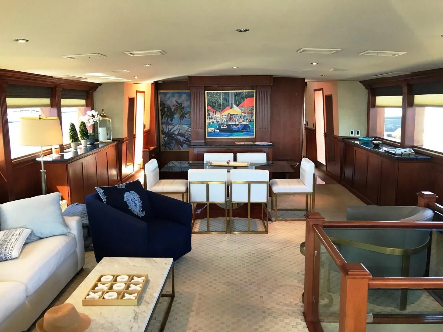 a living room with a couch and a television aboard SEAQUEST Yacht for Sale