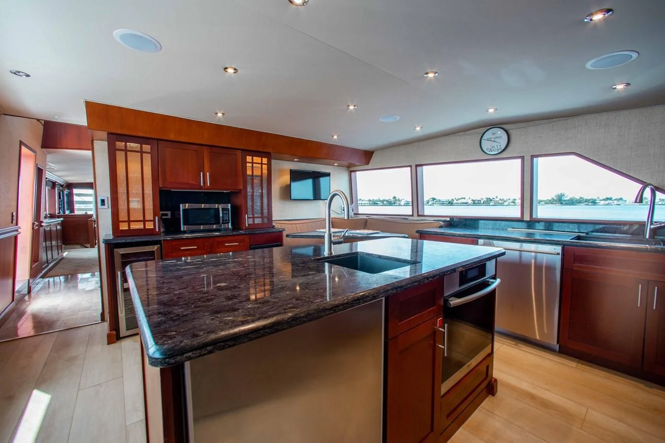 a kitchen with a large island aboard SEAQUEST Yacht for Sale